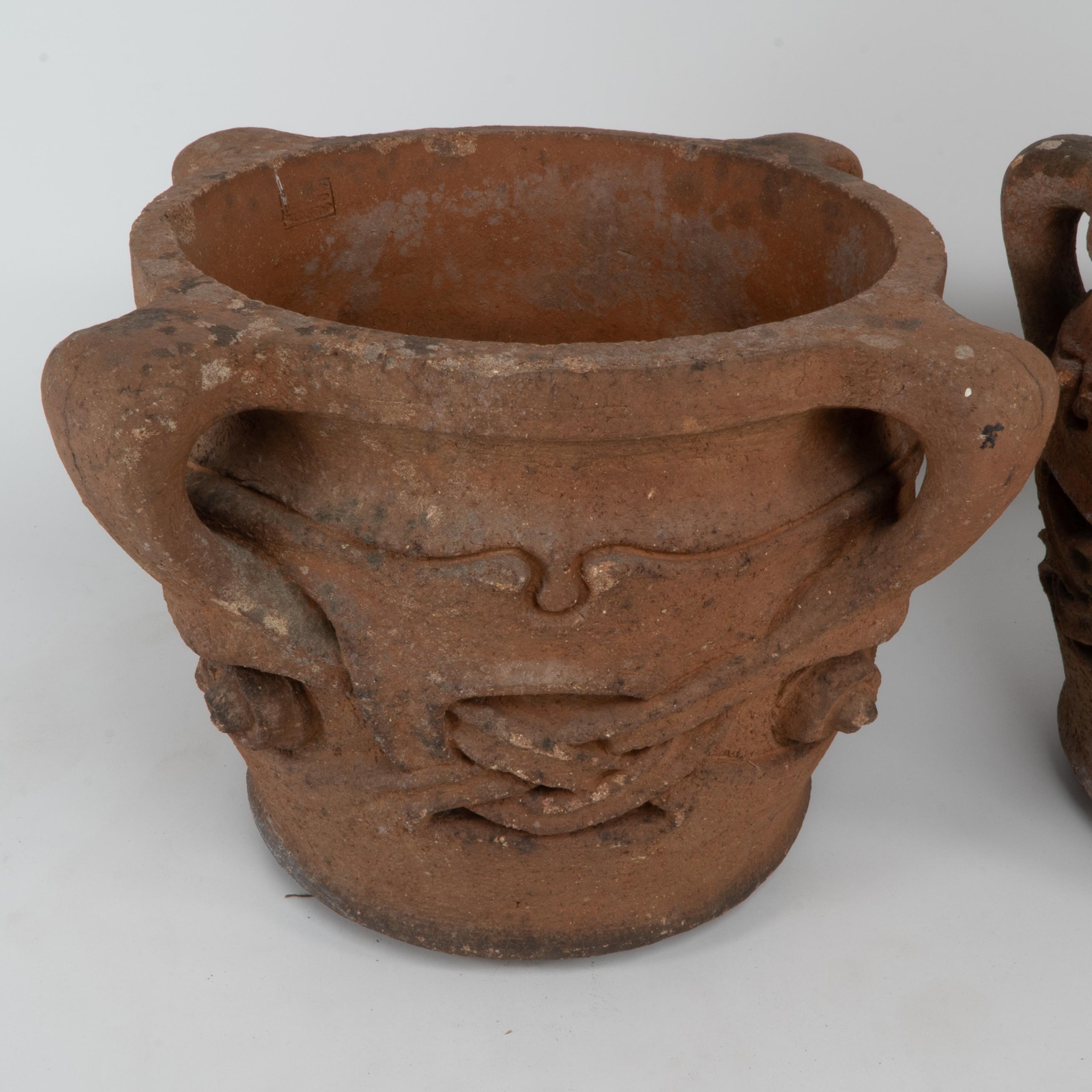 British Archibald Knox. Liberty & Co. A rare & original pair of terracotta Olaf planters For Sale