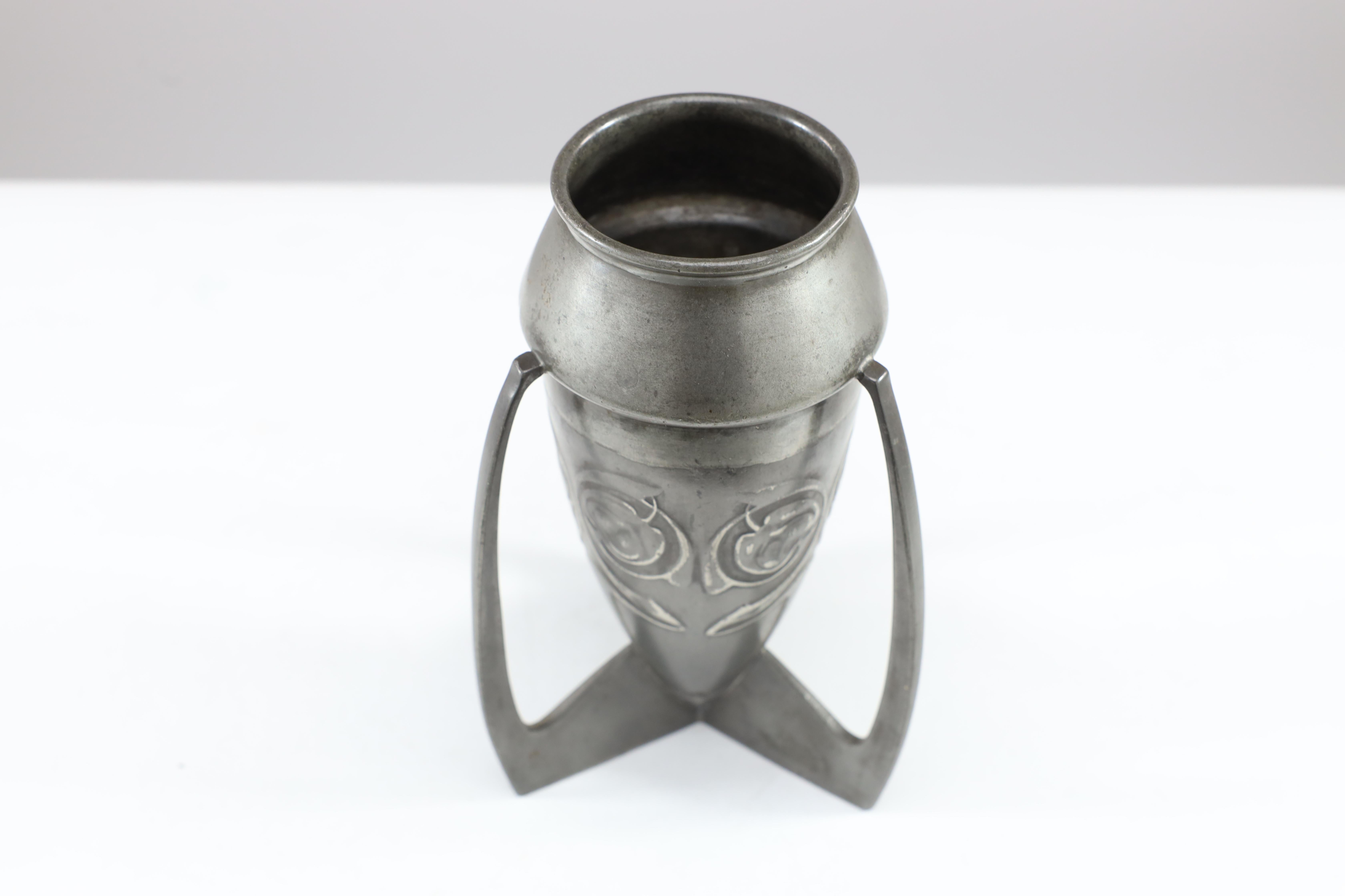 Archibald Knox Liberty & Co English Pewter 0226 An Embossed Pewter Rocket Vase  In Good Condition For Sale In London, GB