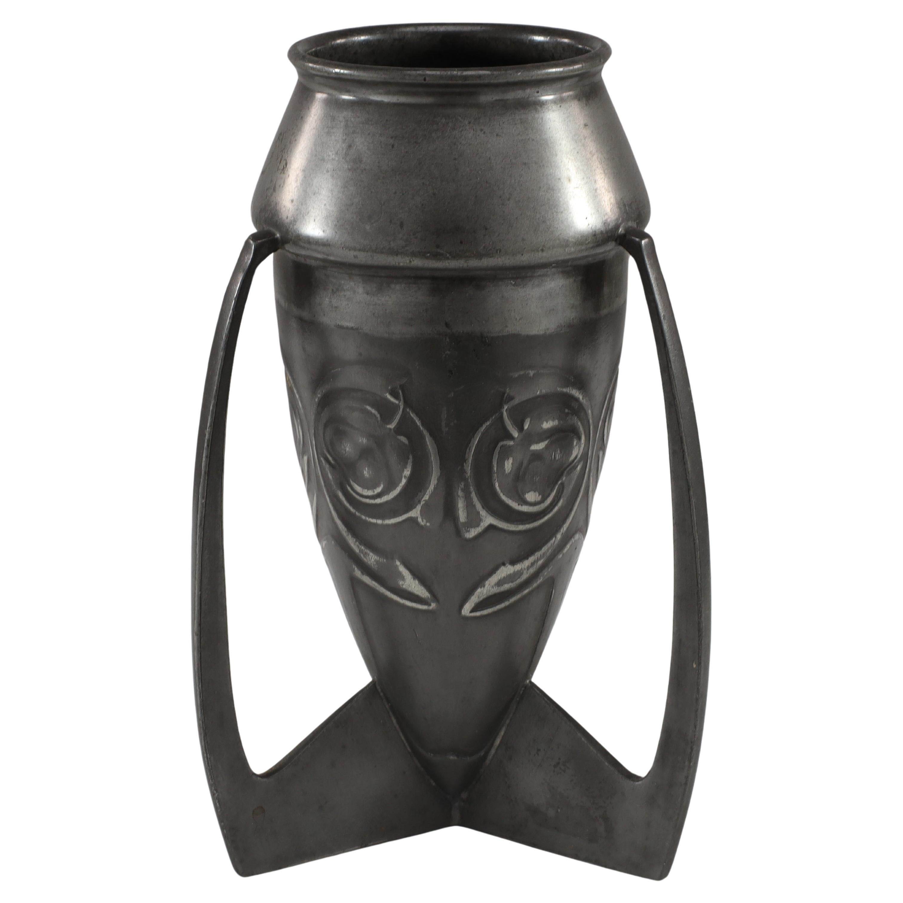 Archibald Knox Liberty & Co English Pewter 0226 An Embossed Pewter Rocket Vase  For Sale