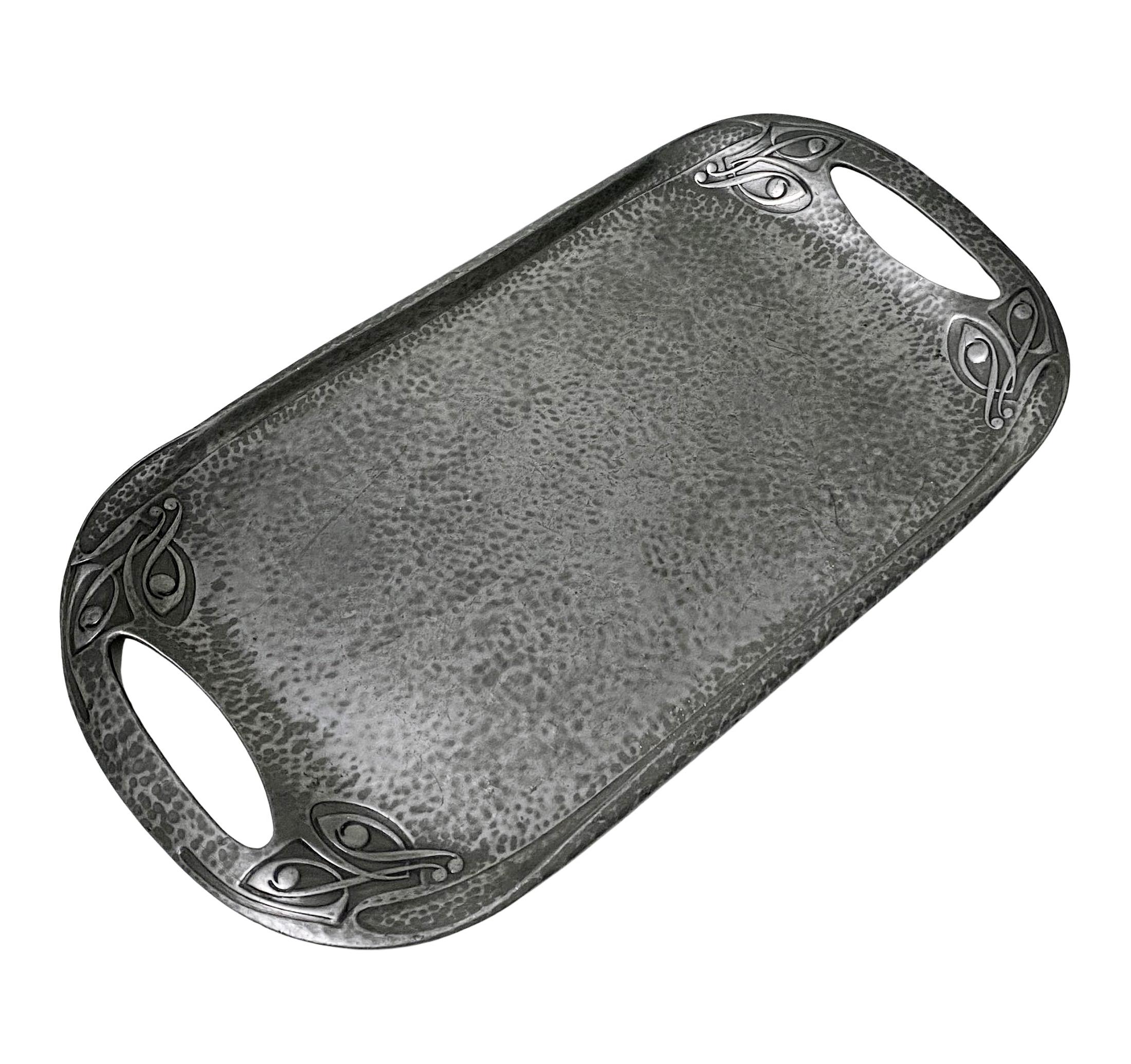 Rare Archibald Knox Liberty Pewter Tray, C.1906. The hammered finish tray with stylised entrelac Knox designs to each cornice. Numbered 0309. Measures 18 x 10 inches. Condition: All original patina no issues.