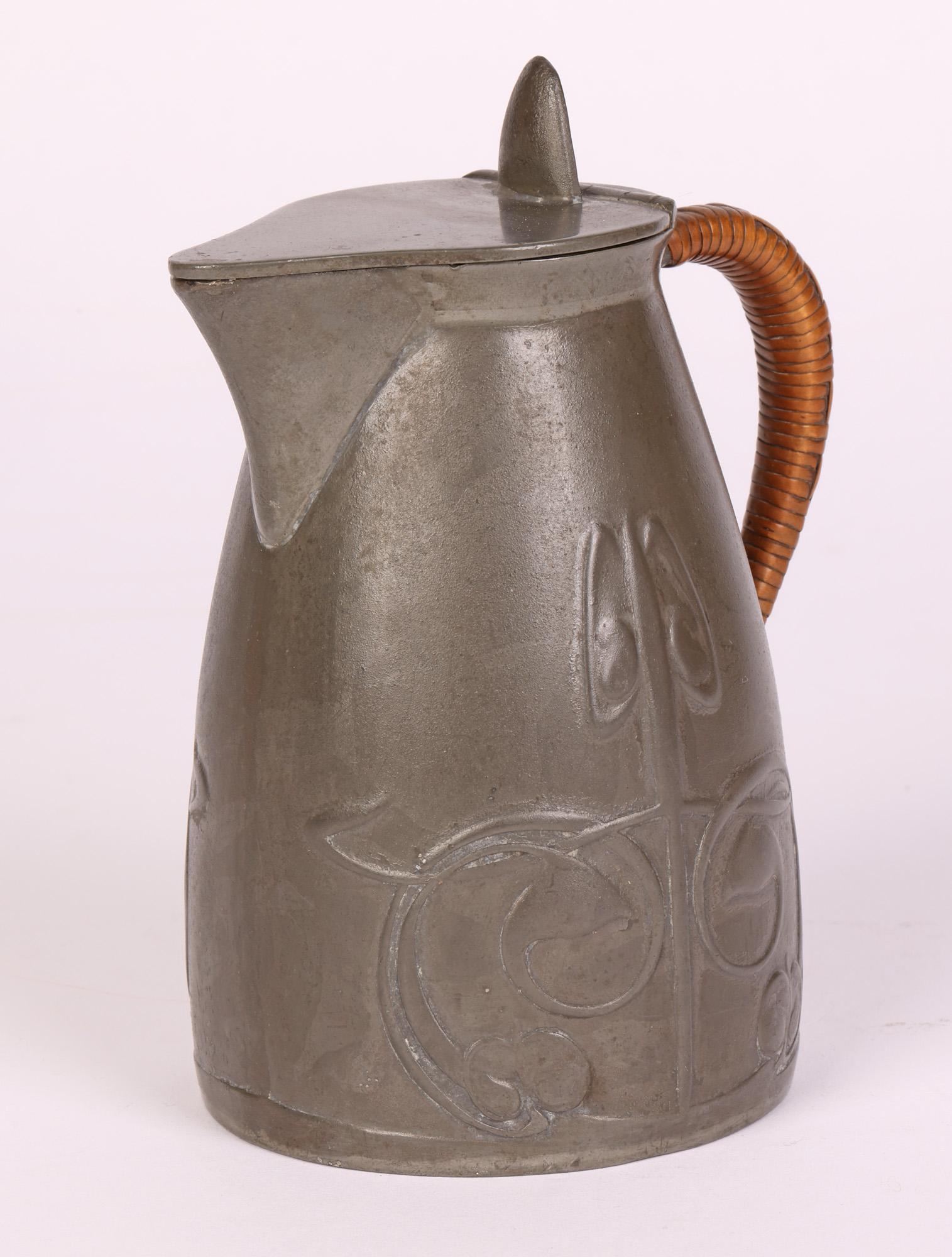 Early 20th Century Archibald Knox Tudric Art Nouveau Lidded Pewter Jug For Sale