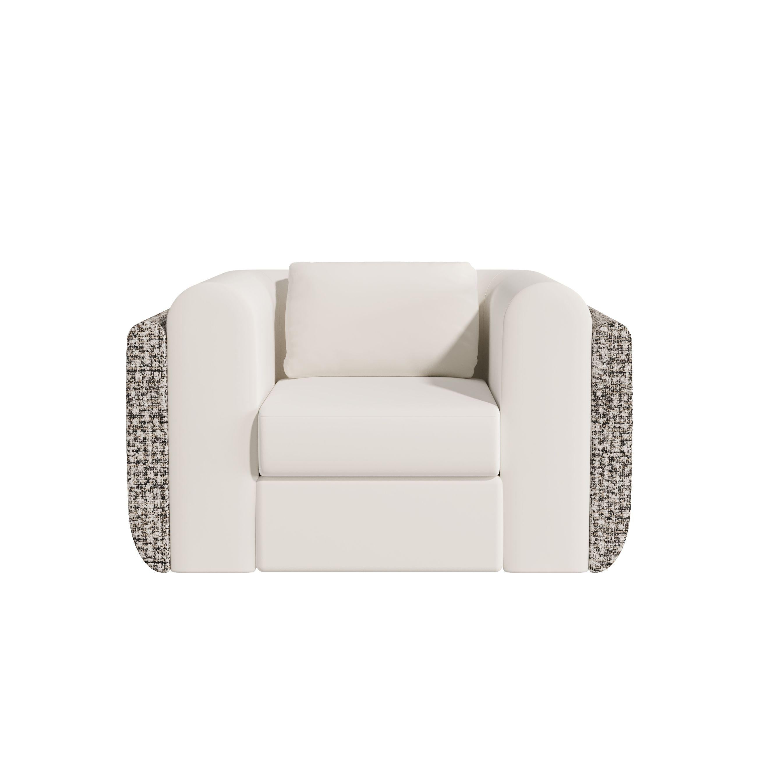 Le fauteuil ARCHIE apporte une nouvelle interprétation du design du canapé ARCHIE, avec une silhouette rappelant un carré aux angles adoucis et arrondis. Les accoudoirs reprennent ce design et se terminent par une forme lisse et arrondie pour plus