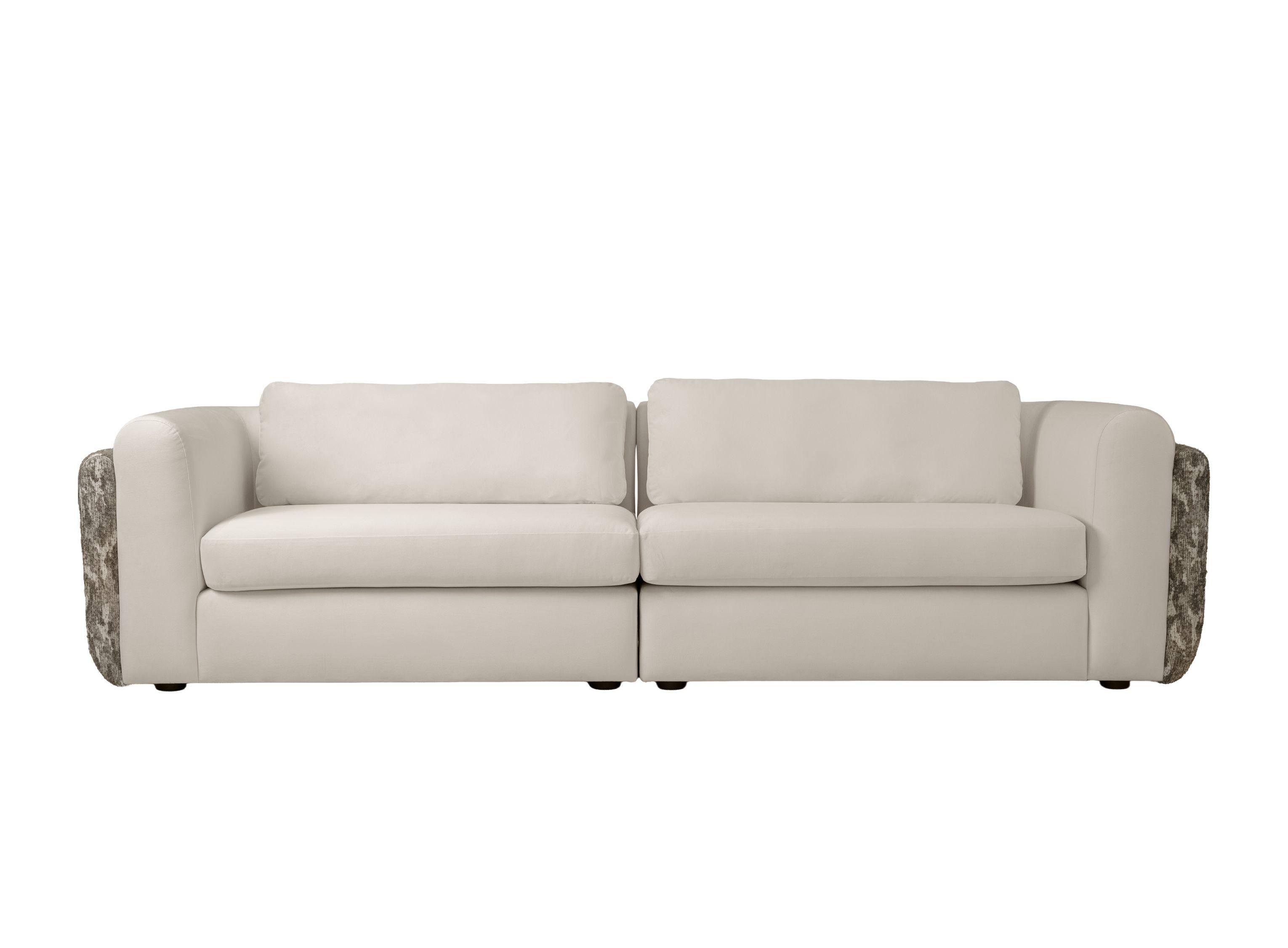 Le canapé ARCHIE de la collection Essence offre un mélange de charme classique et de personnalisation moderne. Disponible en deux tailles, ce canapé vous permet de personnaliser la couleur du socle pour l'adapter à votre espace.

Les accoudoirs