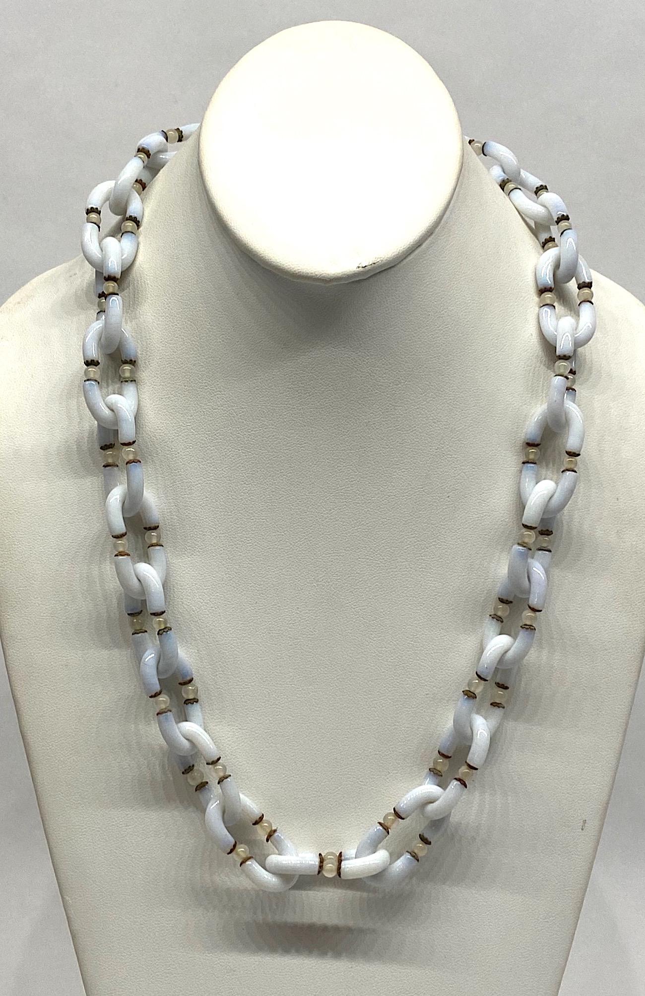 A beautifully hand crafted white and opaline glass chain necklace by famous Italian glass house Seguso circa 1960. These necklaces were designed by Archimede Seguso in collaboration with Coco Chanel. The glass 