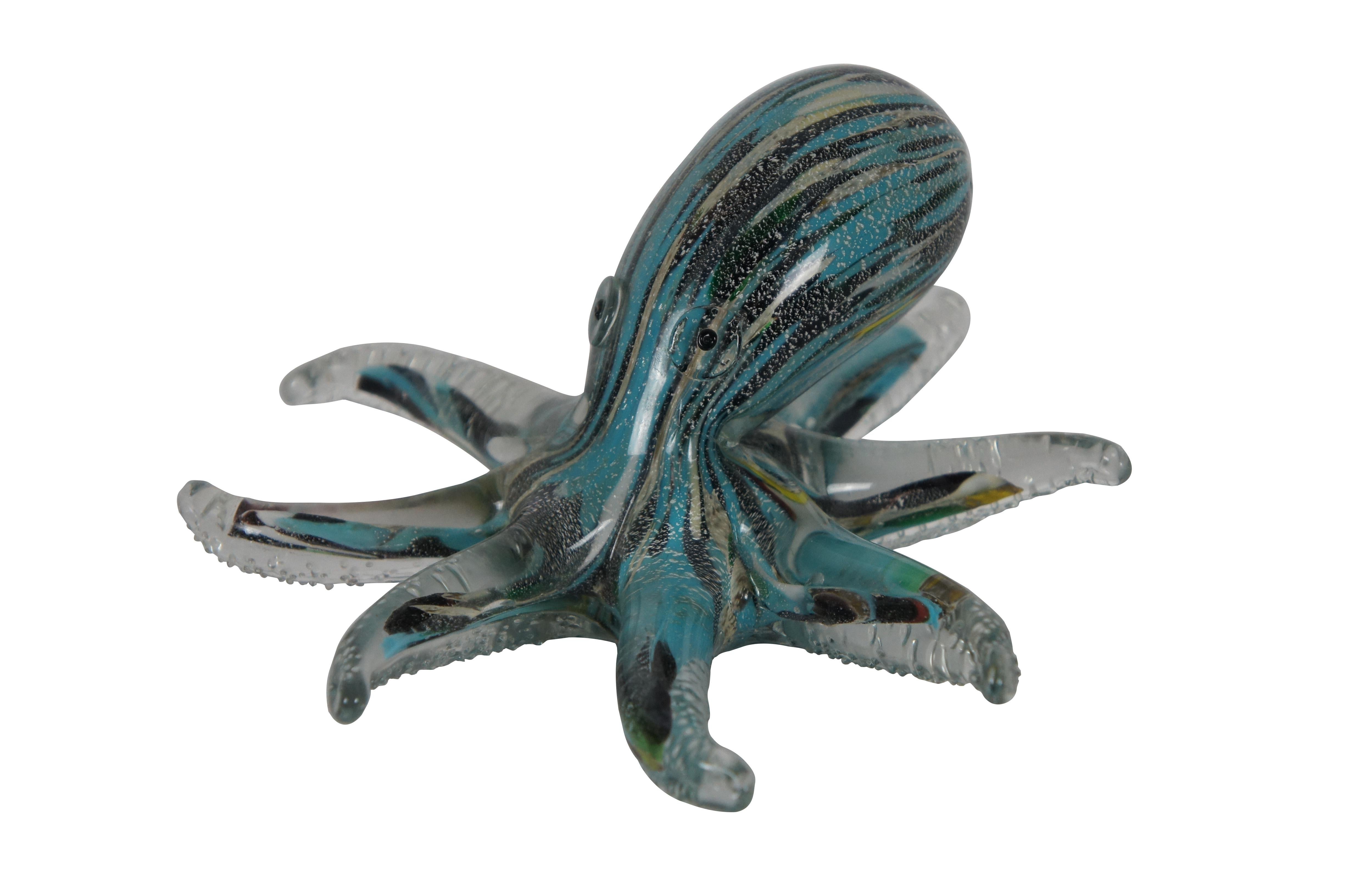 Vibrant Octopus sculpture by Archimede Seguso for Murano.  Features an elegant shape with swirls of turquoise, black, green and clear.

Dimensions:
7.25