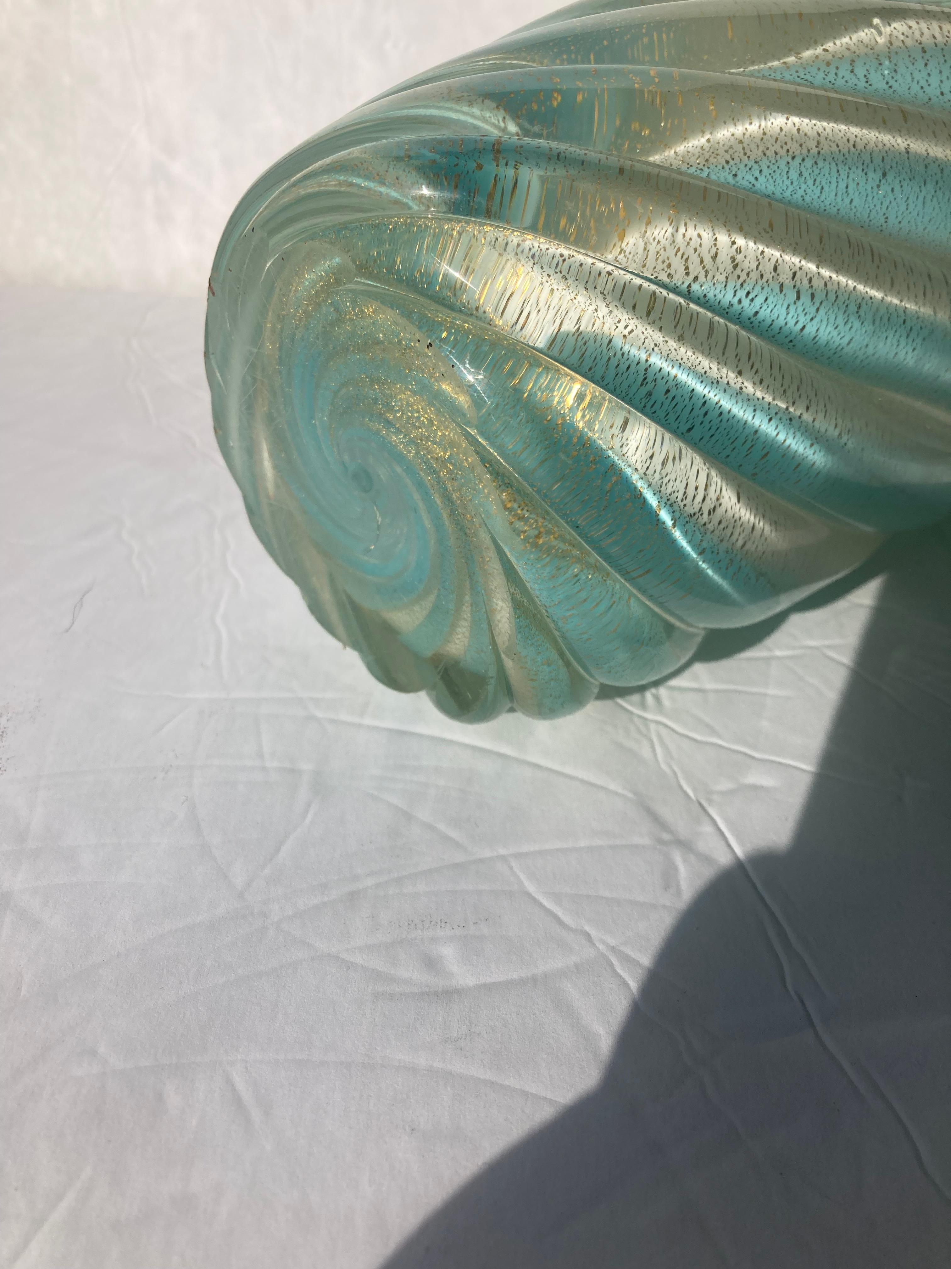 Beautiful and large ribbed vase in gold and opaline Murano glass by the well known Italian artist Seguso. Amazing gold dust colors.