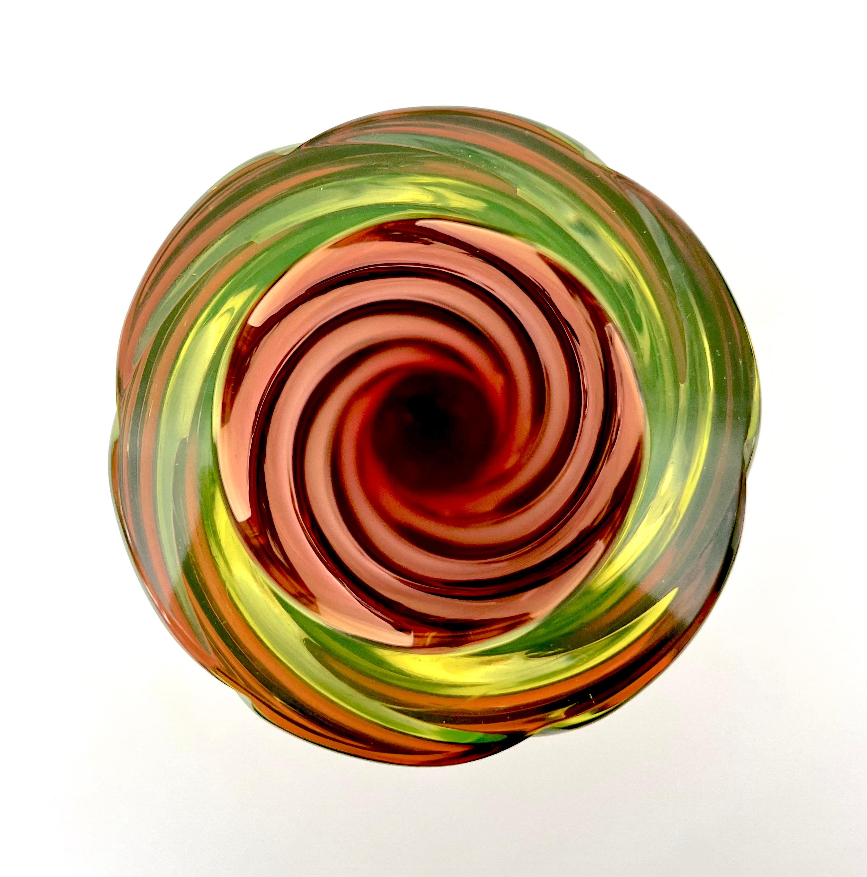 Rare multi-colored ribbed vase by Archimede Seguso for Seguso Vetri d'Arte with possible hand of Flavio Poli. The dynamics and color change as you move this large vase around from yellow and green on the outer edge to a taupe cinnabar cranberryish