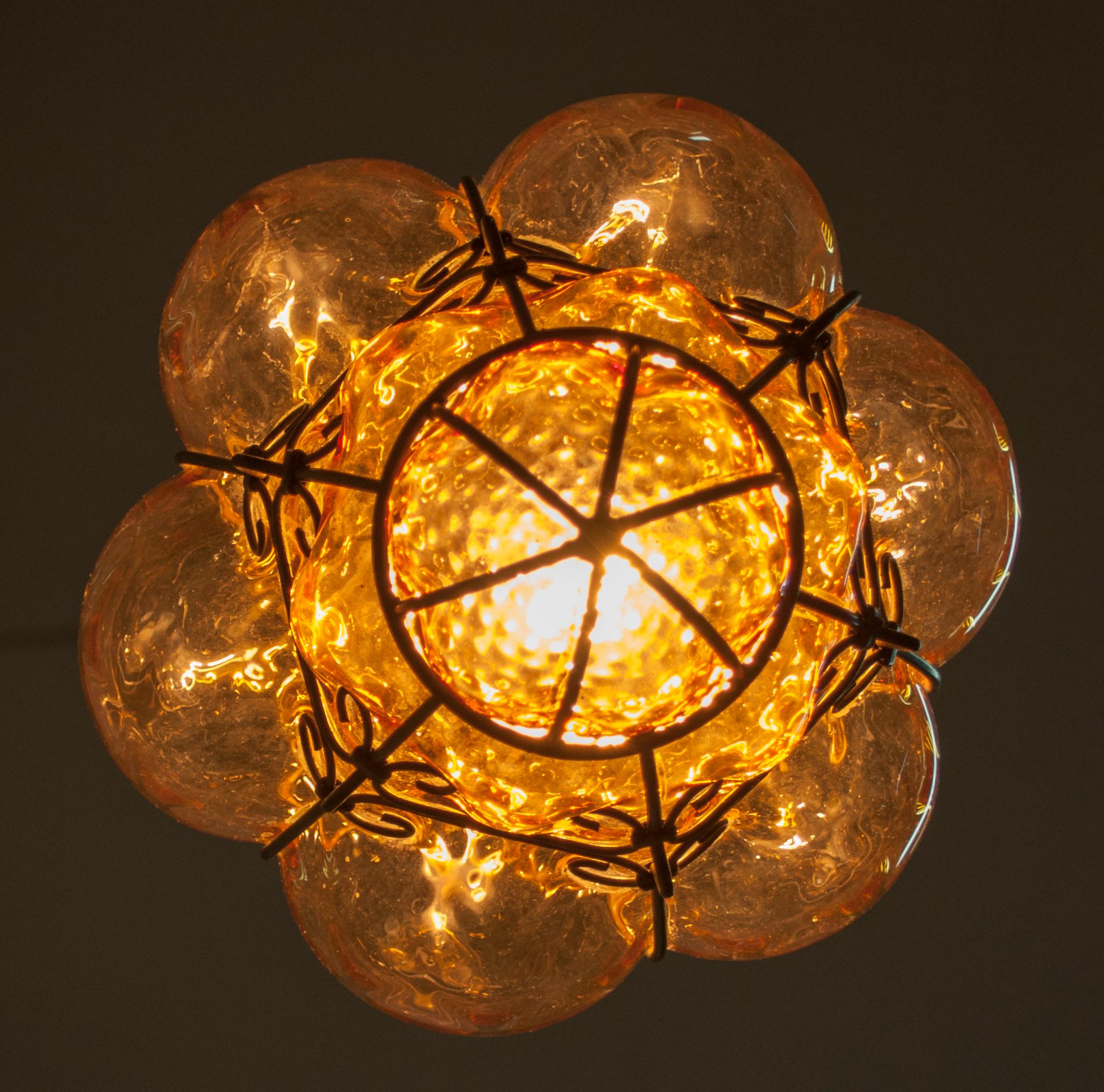 Verre de Murano Lampe à suspension en verre ambré soufflé de Murano, de style mi-siècle moderne, d'Archimede Seguso, 1945 en vente