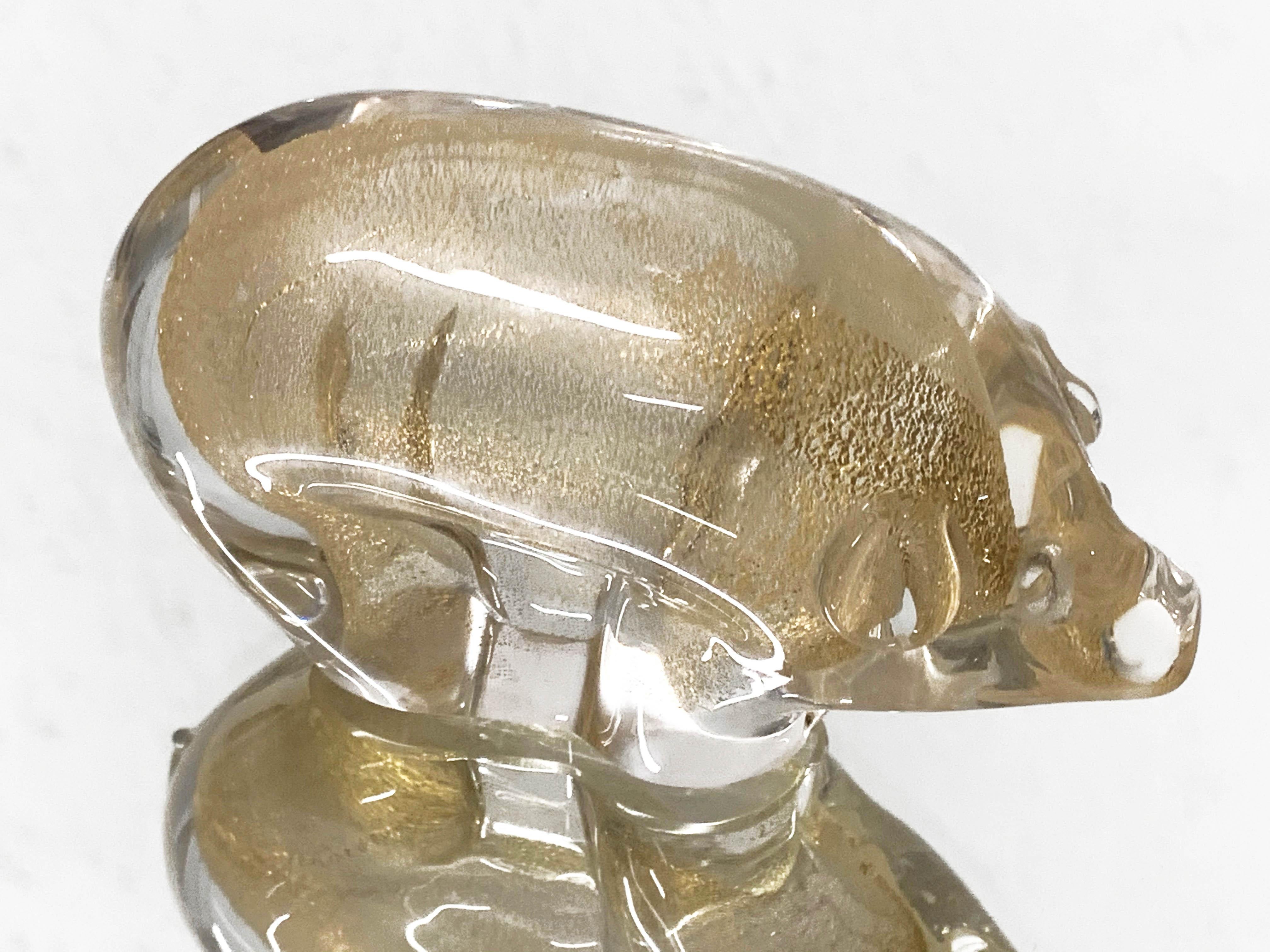 Beautiful hand blown midcentury artistic Murano glass pig sculpture with gold dots. This amazing item is attributed to the designer Archimede Seguso and was produced in Italy during the 1960s.

This sculpture is amazing as Seguso was able to blow