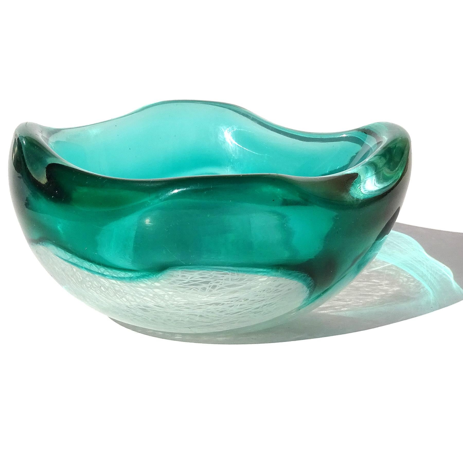 Beautiful and rare, vintage Murano hand blown green and white ribbons Italian art glass decorative bowl, vide-poche. The bowl is documented to designer Archimede Seguso, circa 1952. Created in the 