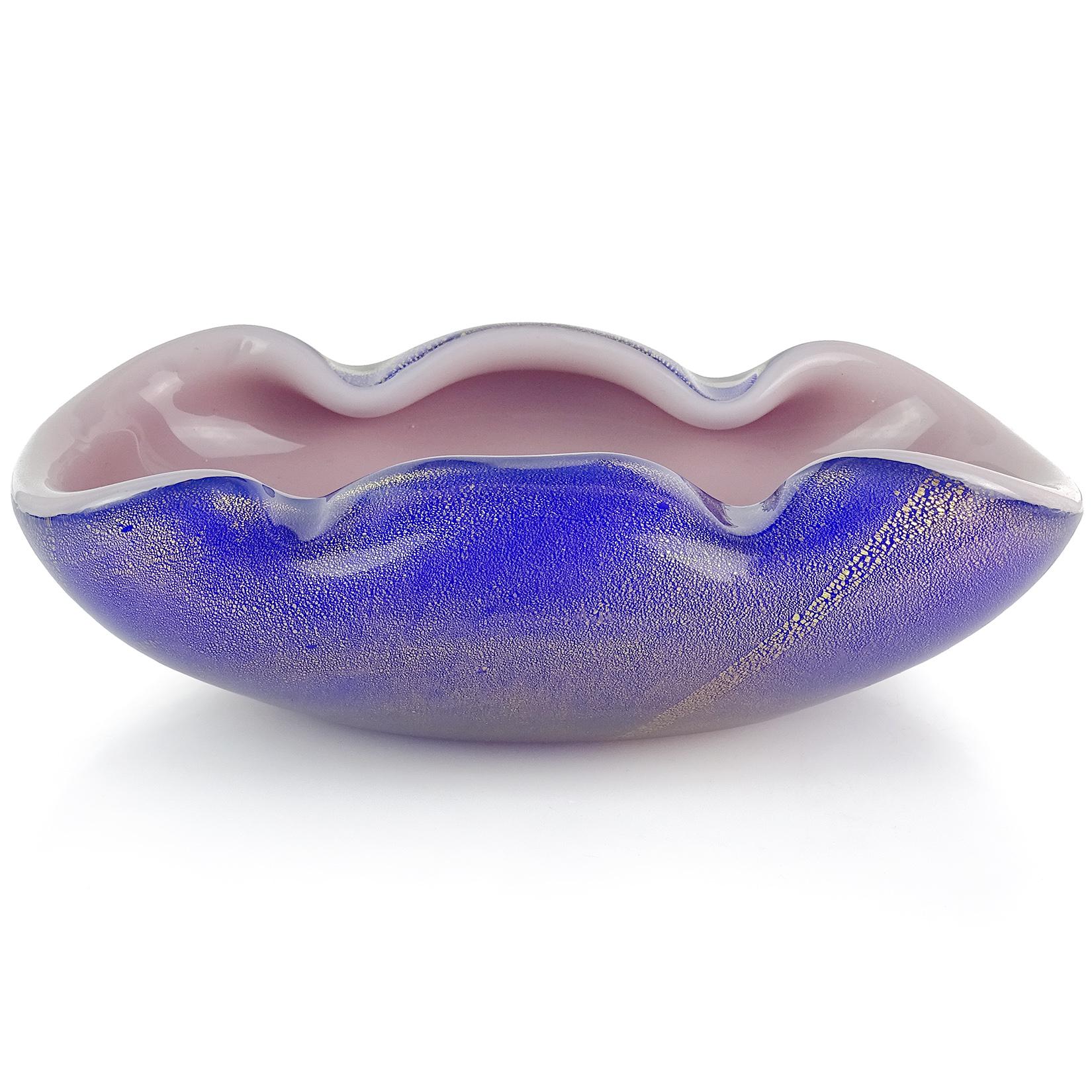 Beautiful vintage Murano hand blown cobalt blue over lavender purple and gold flecks Italian art glass decorative bowl. Documented to designer Archimede Seguso, in the 