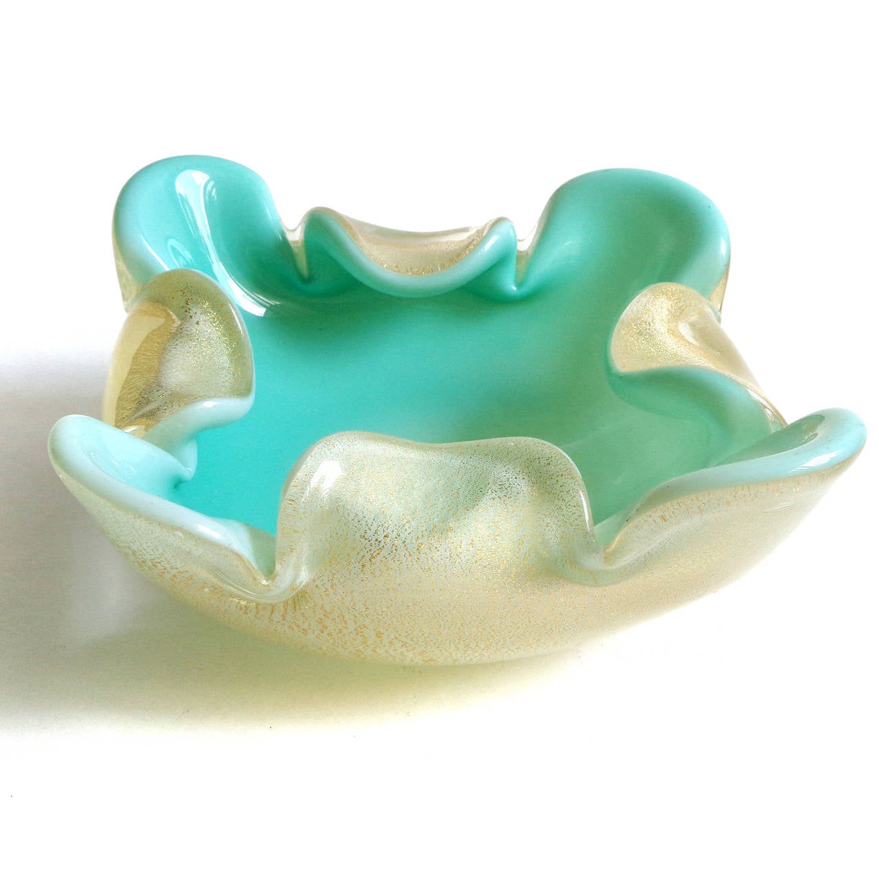 Priced per item (2 available). Beautiful Murano hand blown white and gold flecks over aqua Italian art glass bowls. Attributed to designer Archimede Seguso. The two bowls are profusely covered in gold leaf. Has folded in and pulled out rim. They