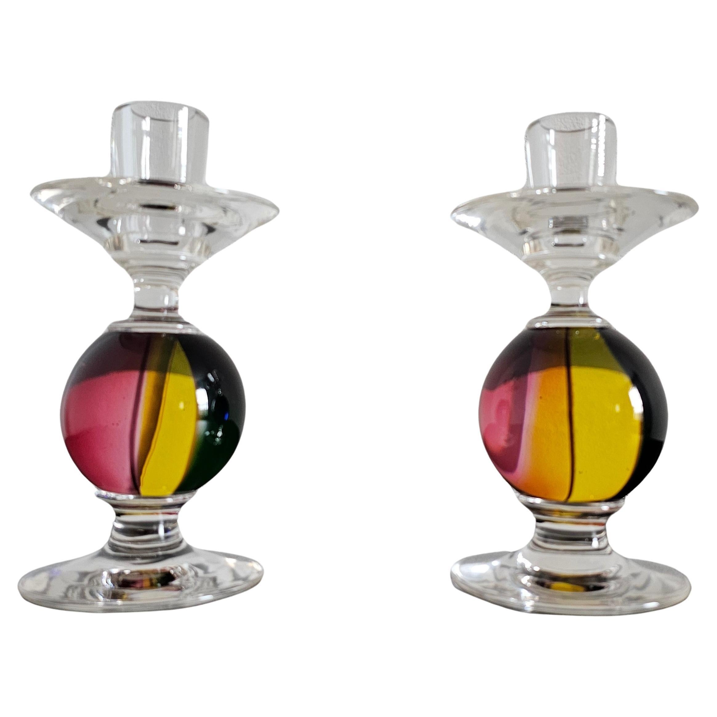 A remarkable pair vintage Italian postmodern style Murano carnevale art glass candle holders by Archimede Seguso (1909-1999) for Tiffany & Co. 

Recalling the brilliant colors of the Venetian carnival, featuring a distinctive multi-color sphere with