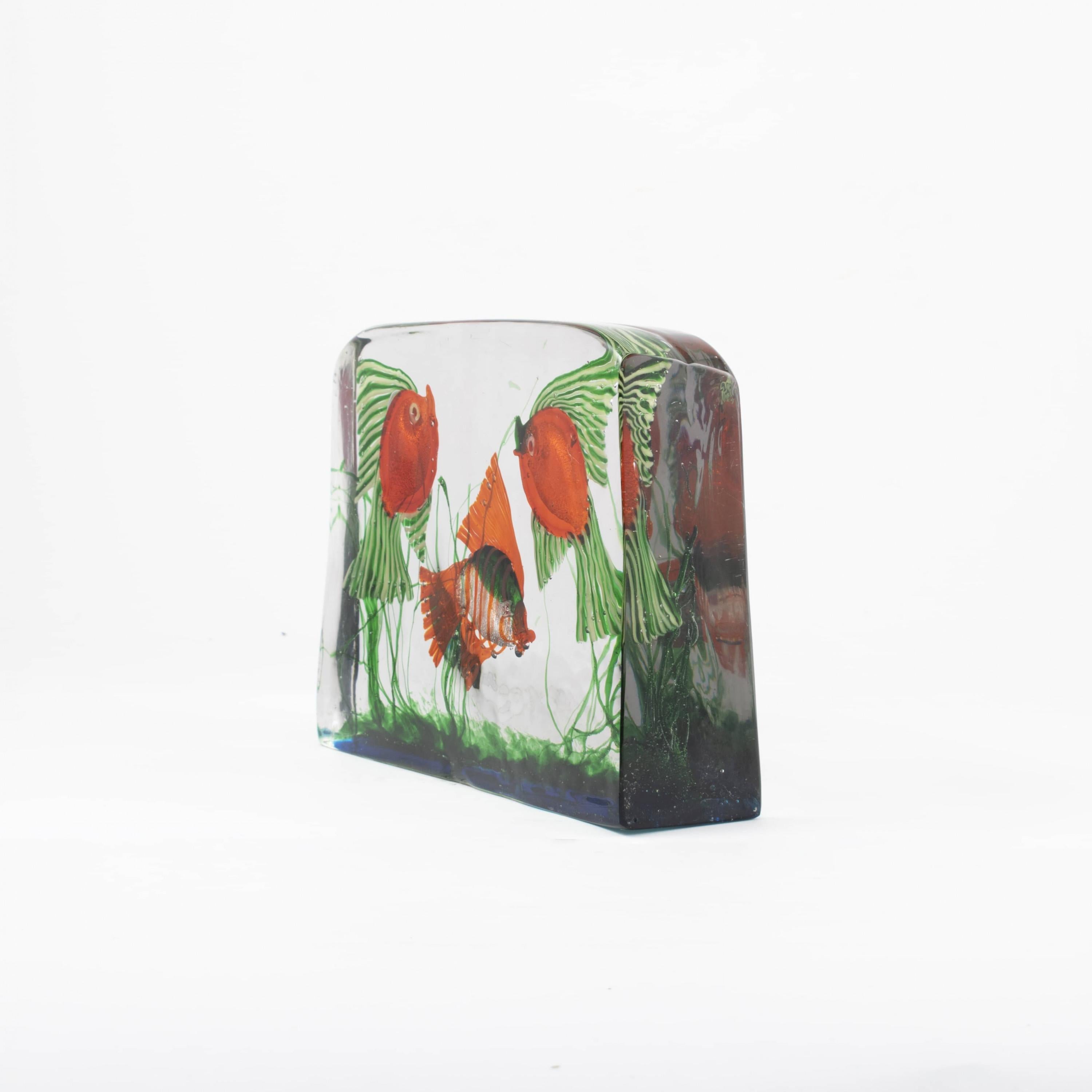 Archimede Seguso.
Italian Murano glass fish aquarium. Featuring multicolored inclusions with three fish and seagrass.
Italy, Venice 1950-1959.

The Seguso family has been dedicated to the art of Murano glass in Venice since 1397. Seguso is one