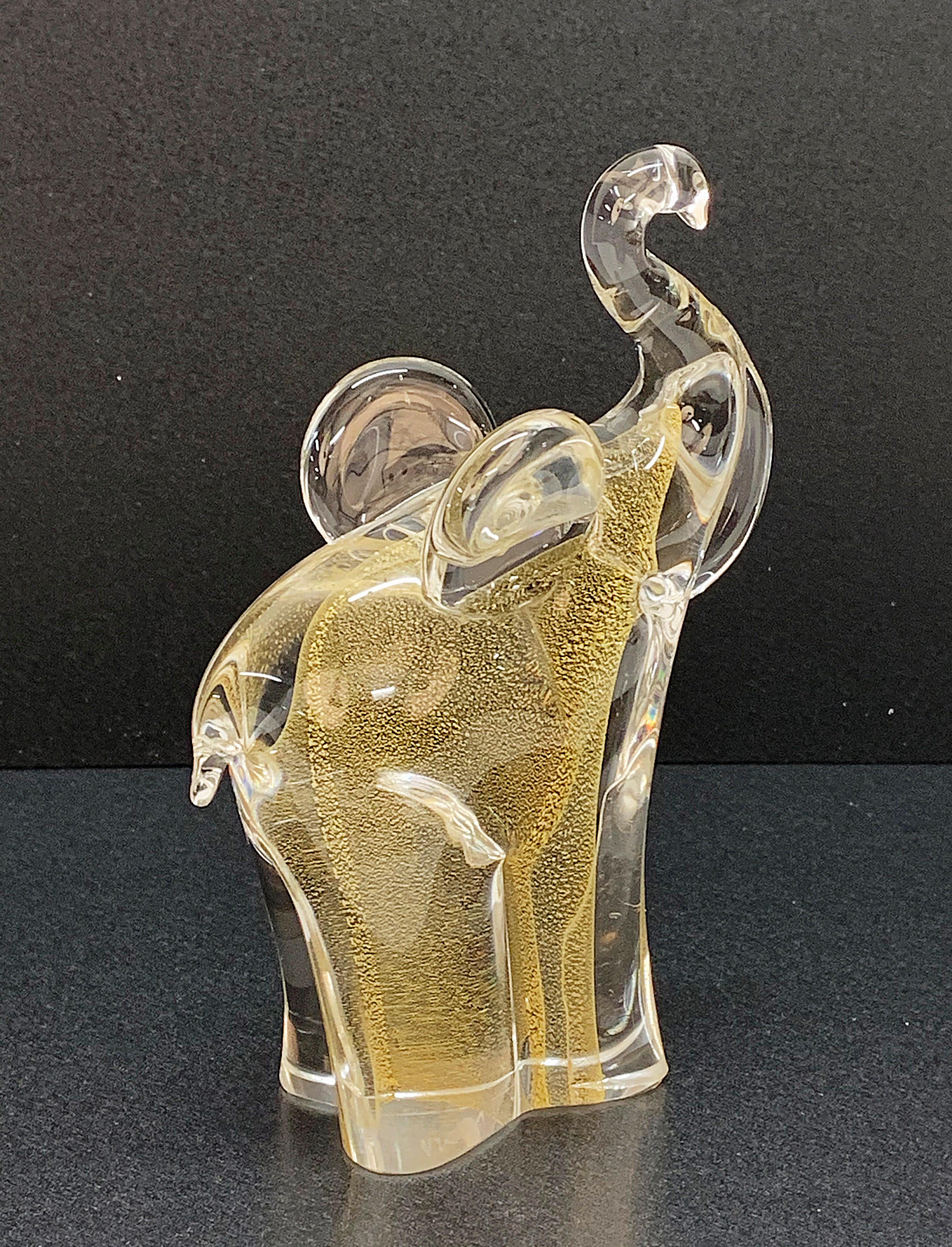 Midcentury beautiful elephant sculpture in artistic handblown Murano glass with gold dots. This fantastic object is attributed to the Murano Glass master Archimede Seguso and was produced in Italy during the 1960s.

This sculpture is very