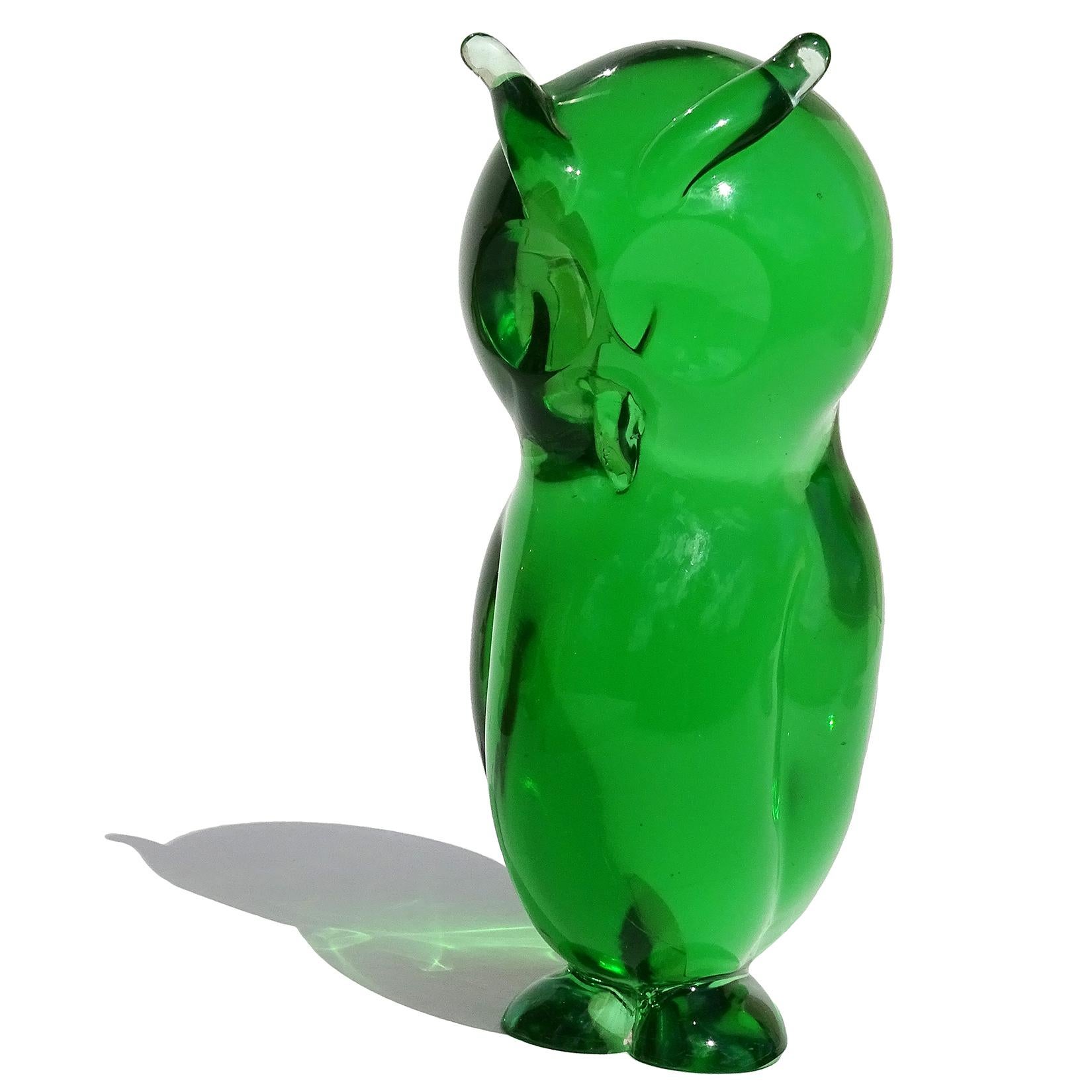 Beautiful vintage Murano hand blown Sommerso green Italian art glass horned owl bird sculpture. Documented to designer Archimede Seguso. I have personally owned another owl identical to this piece, in a different color, with original Seguso labels.