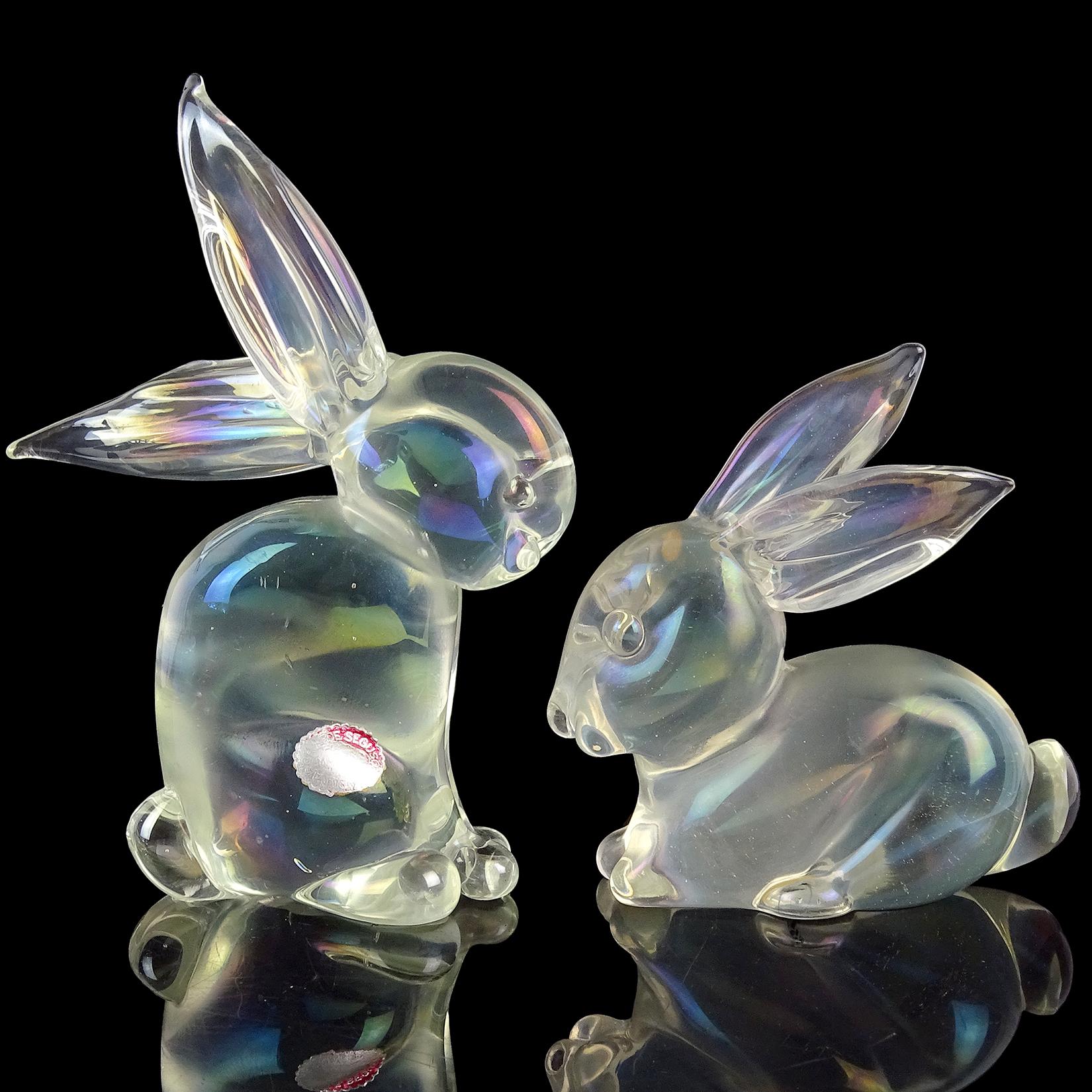 Beautiful and very cute set of Murano hand blown clear iridescent Italian art glass bunny rabbit sculptures or figurines. Documented to designer Archimede Seguso. The standing rabbit has the full 