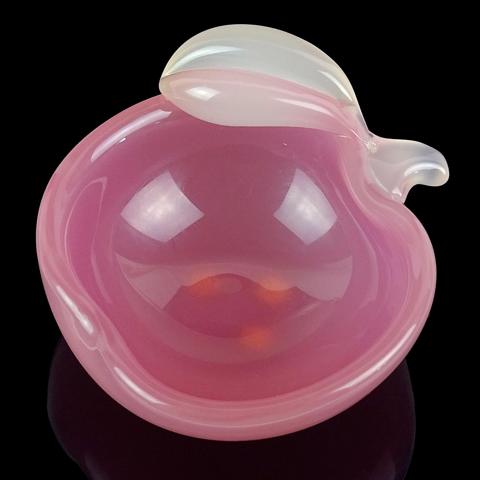 Beautiful vintage Murano hand blown opalescent pink and white Italian art glass apple shaped decorative bowl. Documented to designer Archimede Seguso, from the “Alabastro” series. Can be used as a display piece on any table. Perfect as a ring or