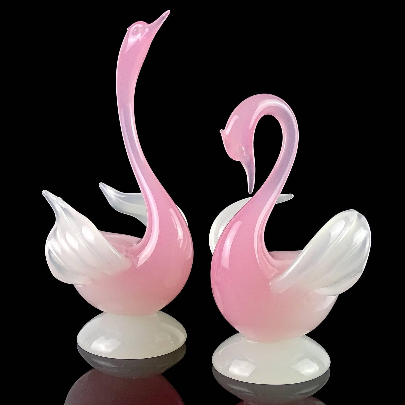 Gorgeous set of vintage Murano hand blown, opalescent pink and white Italian art glass courting swan bird sculptures. Documented to designer Archimede Seguso, from the 