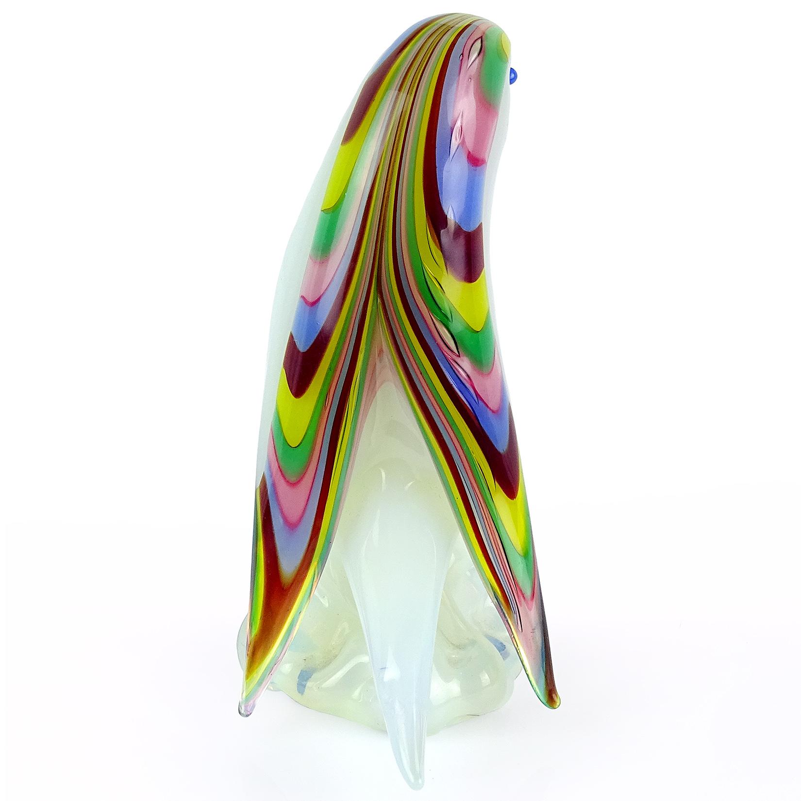 Beautiful vintage Murano hand blown, opalescent white, with rainbow color feathers Italian art glass bird figurine / sculpture. Documented to designer Archimede Seguso. Very unusual design and color combination. Measures 5