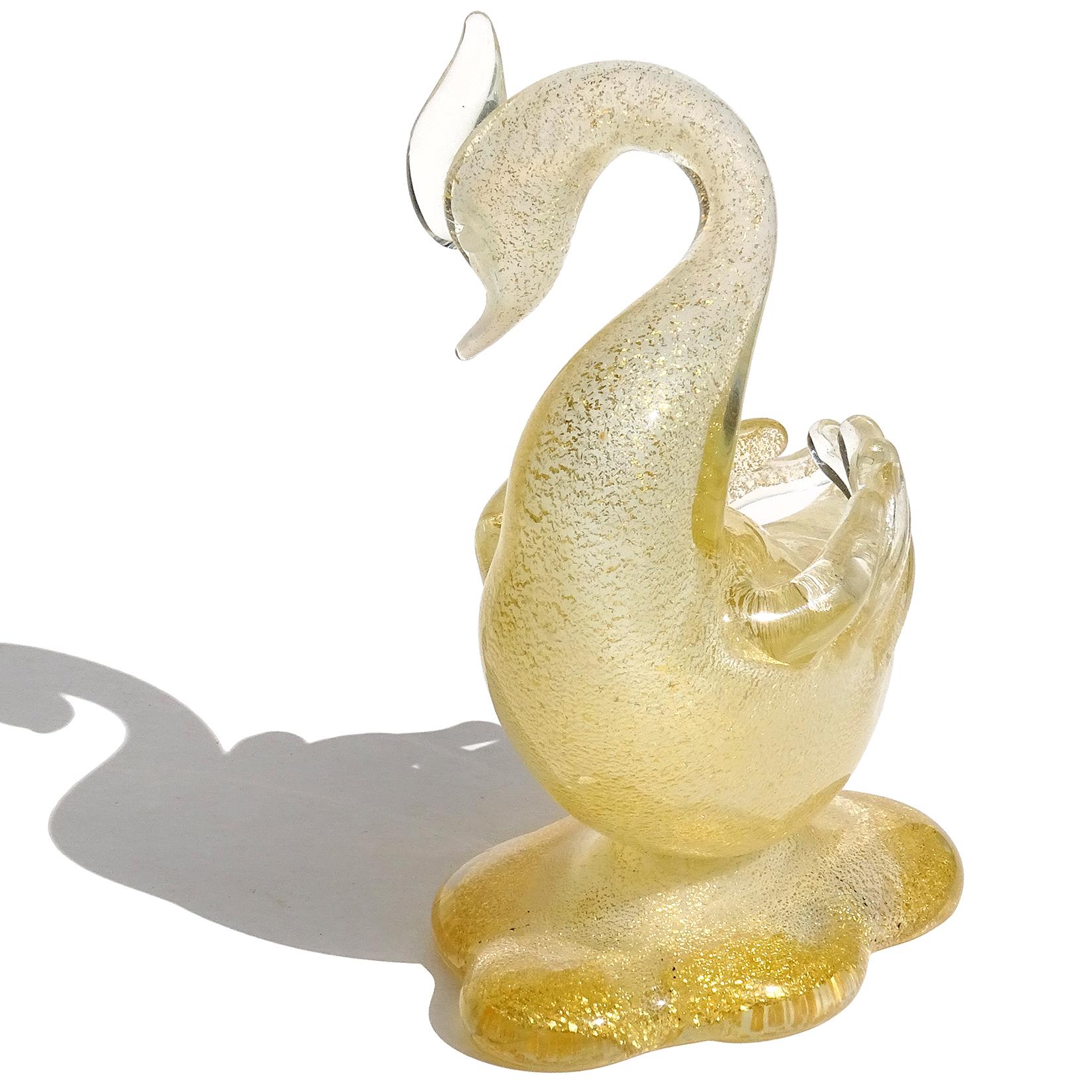 Beautiful vintage Murano hand blown opal white, and gold flecks Italian art glass swan sculpture / figurine. Documented to designer Archimede Seguso, circa 1957, and published (see last photo). The bird is profusely covered in gold leaf, with an