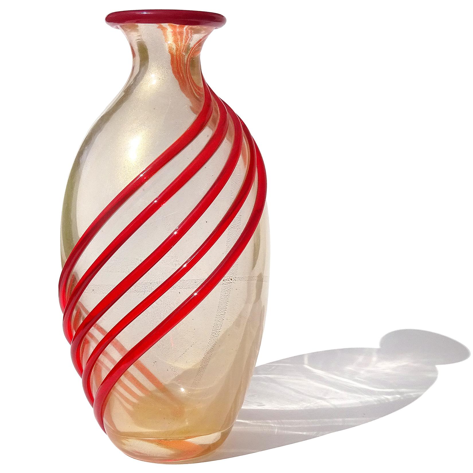 Gorgeous, large vintage Murano hand blown gold flecks with red bands Italian art glass flower vase. Documented to designer Archimede Seguso. The piece is hand signed 