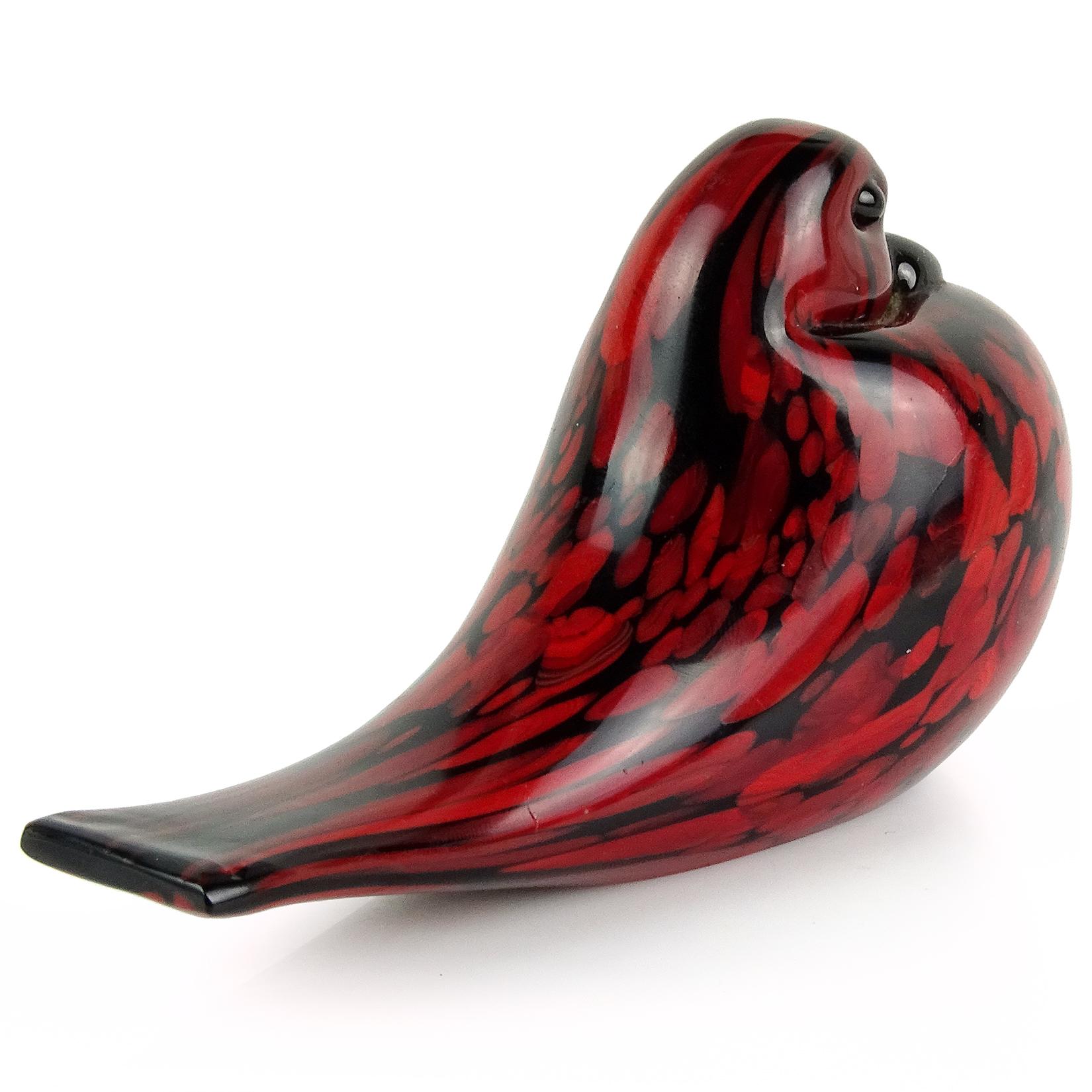 Rare and beautiful vintage Murano hand blown red and black Italian art glass dove bird figure. Documented to designer Archimede Seguso. It still retains the original 