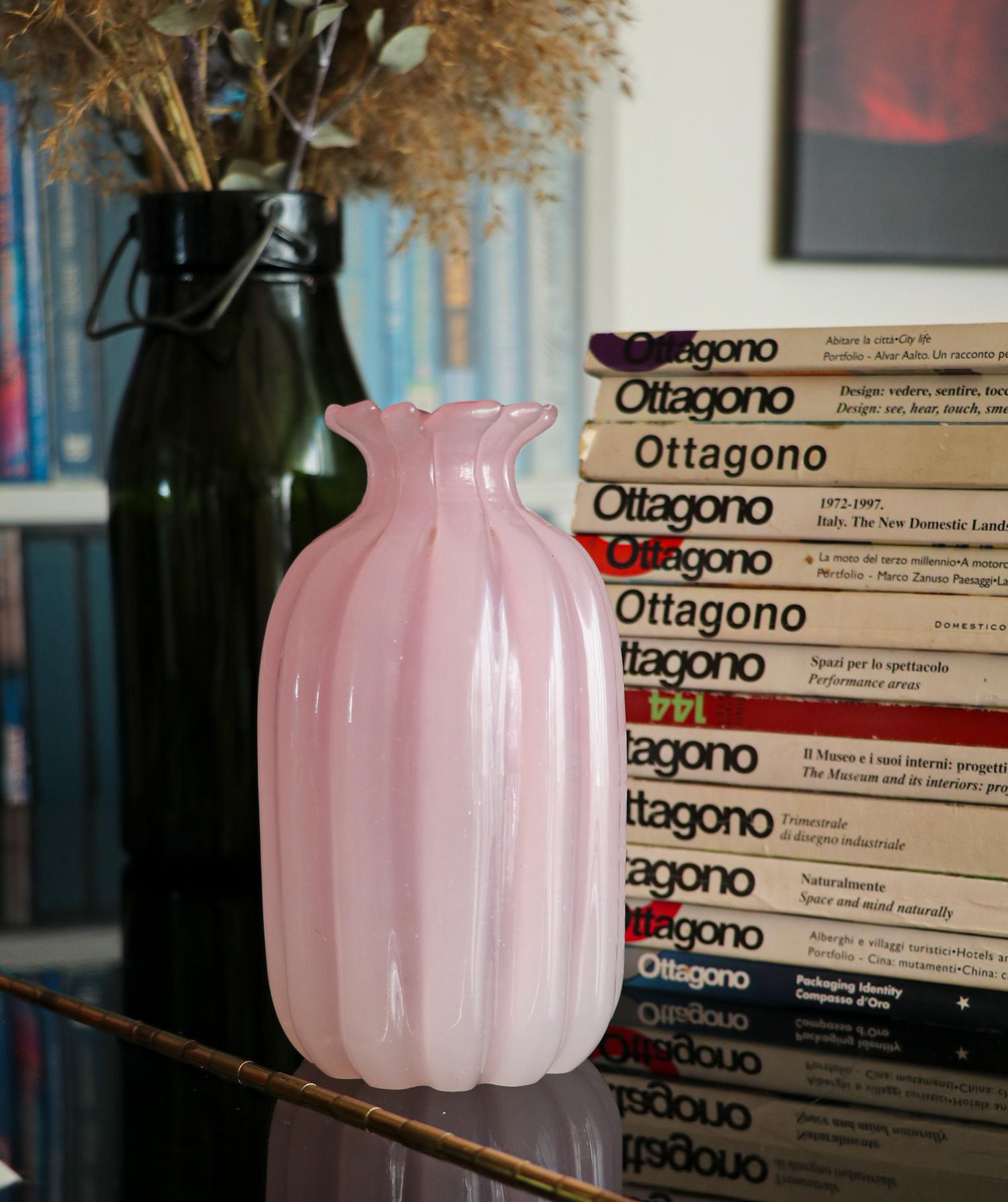 Pink ribbed Alabastro art glass vase by the Italian master-blower Archimede Seguso  and executed by his glassworks in Murano, Italy.

Measures: height 6.9