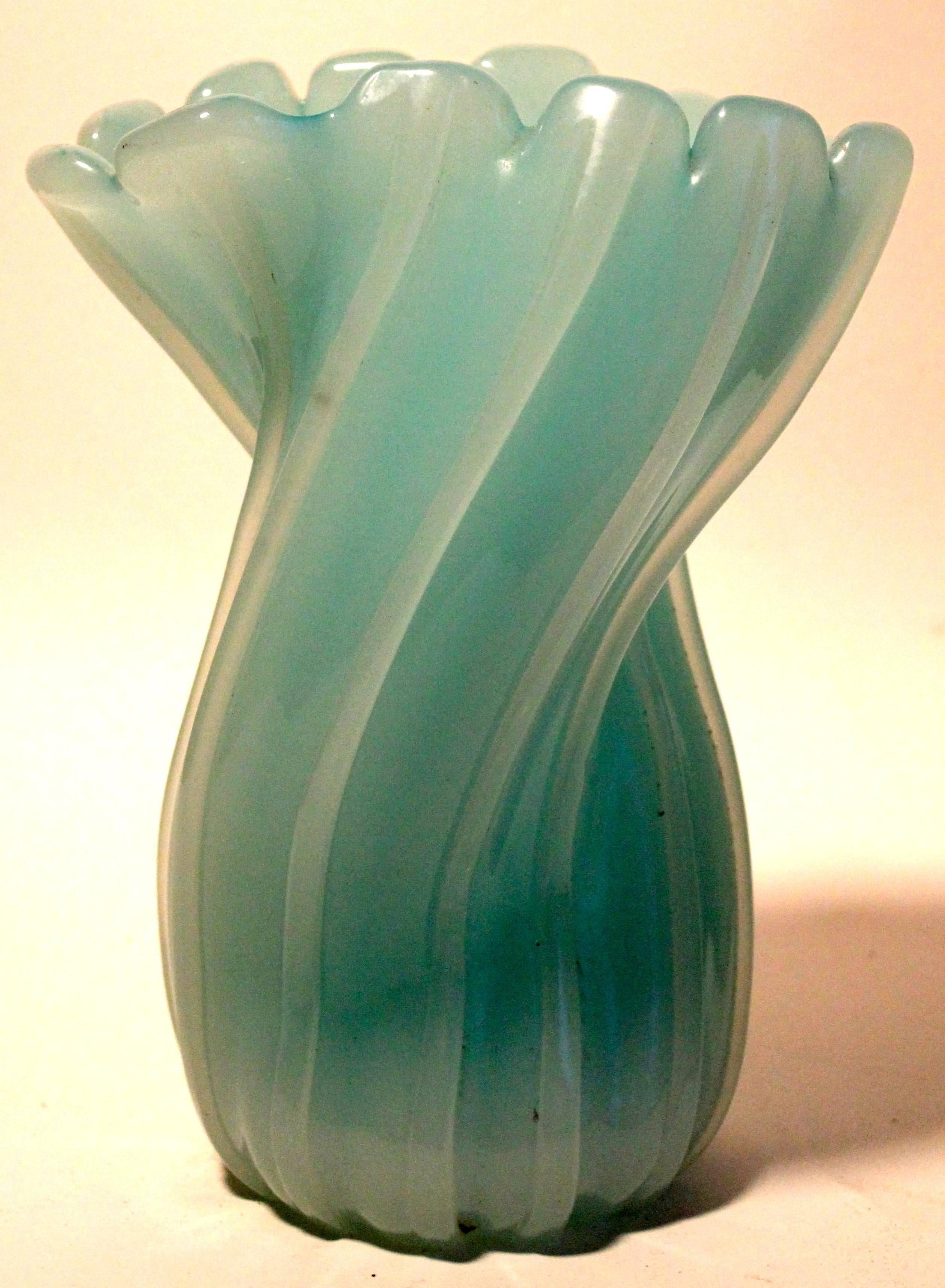 An Archimede Seguso twisted ribbed 'Ritorto a coste' vase in translucent light green glass with twisted ribbing. Reference: 