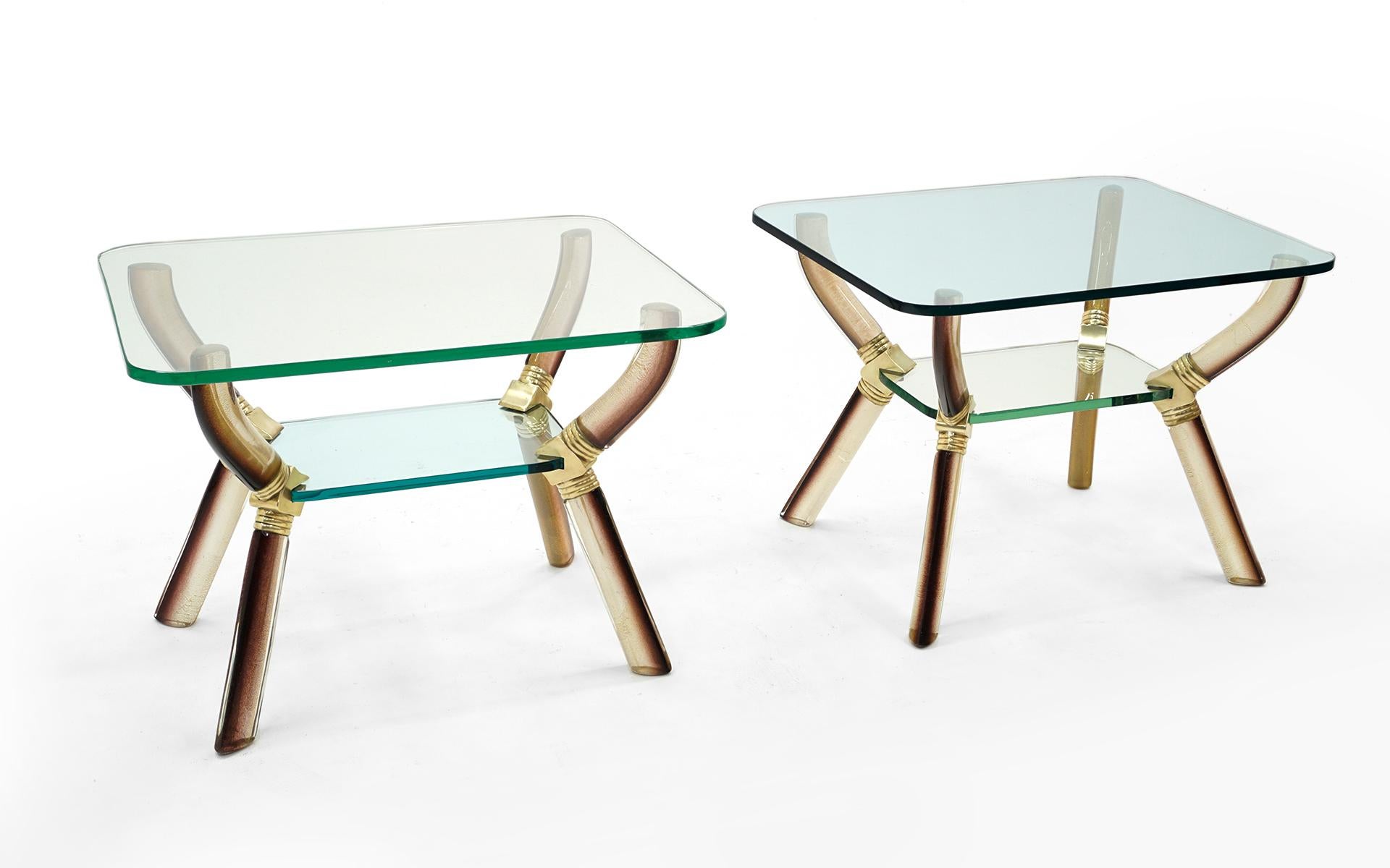 Large scale pair of two tier tables by Vetreria Archimede Seguso, Italy, 1952. Hand-blown a Polveri glass with gold inclusions, glass, brass. No chips or repairs to any of the glass elements. Table tops have light scratches that do not distract from