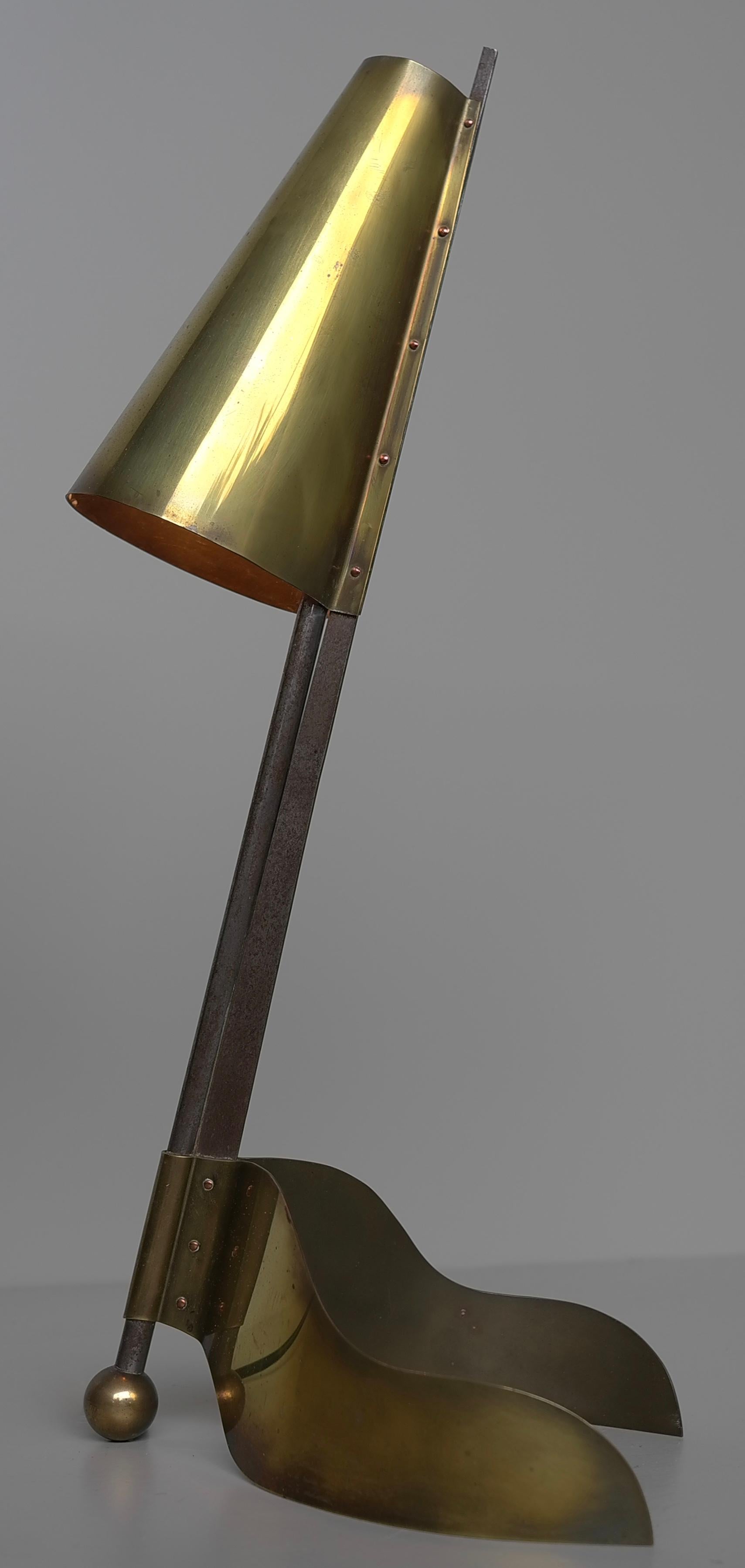 Architect table lamp, Sculptural shaped Copper and Steel, 1930's. We have had this lamp in our private collection and never found the exact history around it. Its one of the most amazing table lamps we have ever came across. Gives a warm orange glow