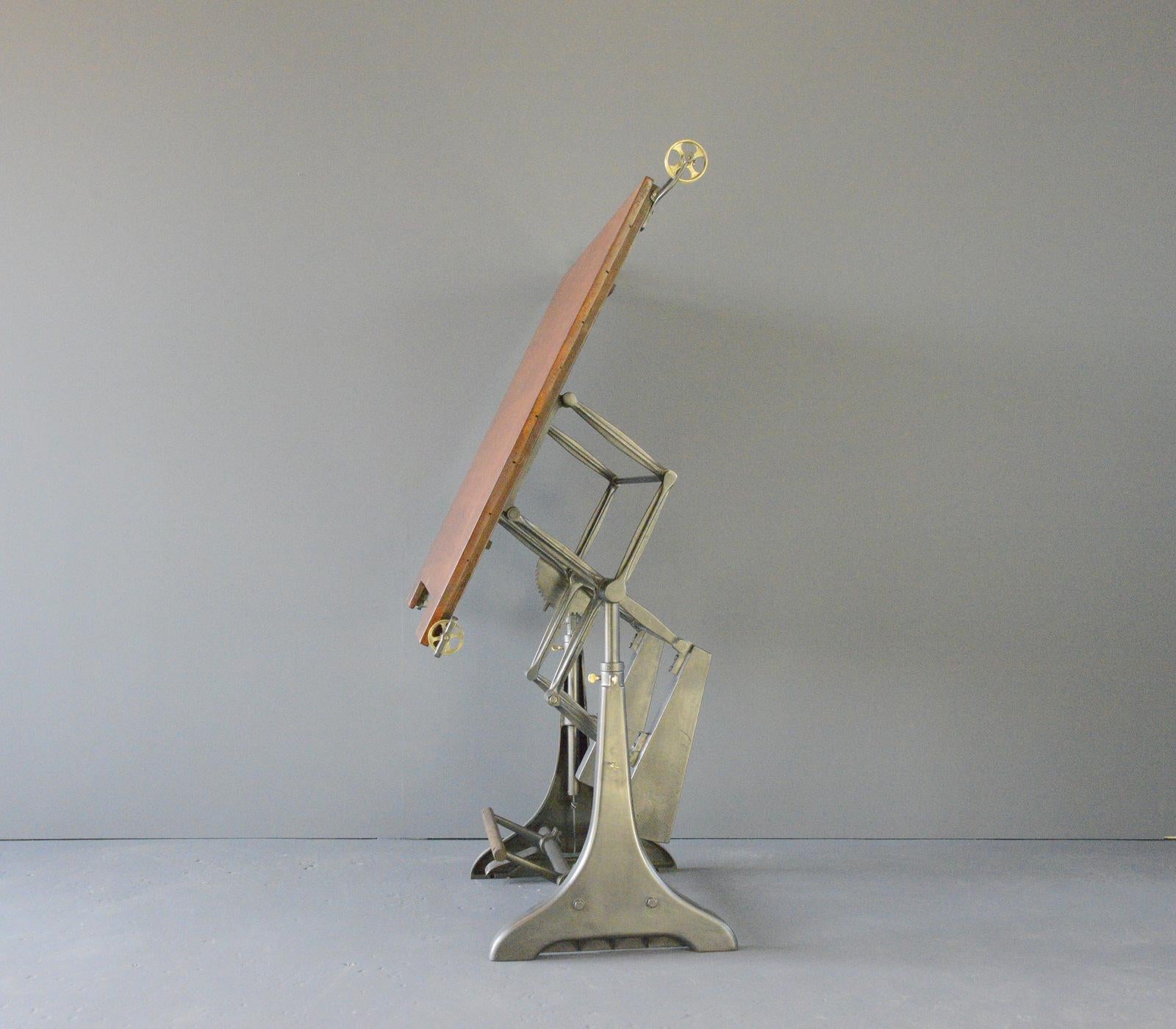Architects Drawing Board circa 1930s

- Articulated cast iron base
- Height adjustable and pivotable 
- Pine board
- Made by Hall Harding Ltd, London
- English ~ 1930s
- 163cm wide x 90cm deep x 190cm tall

Condition Report

Fully