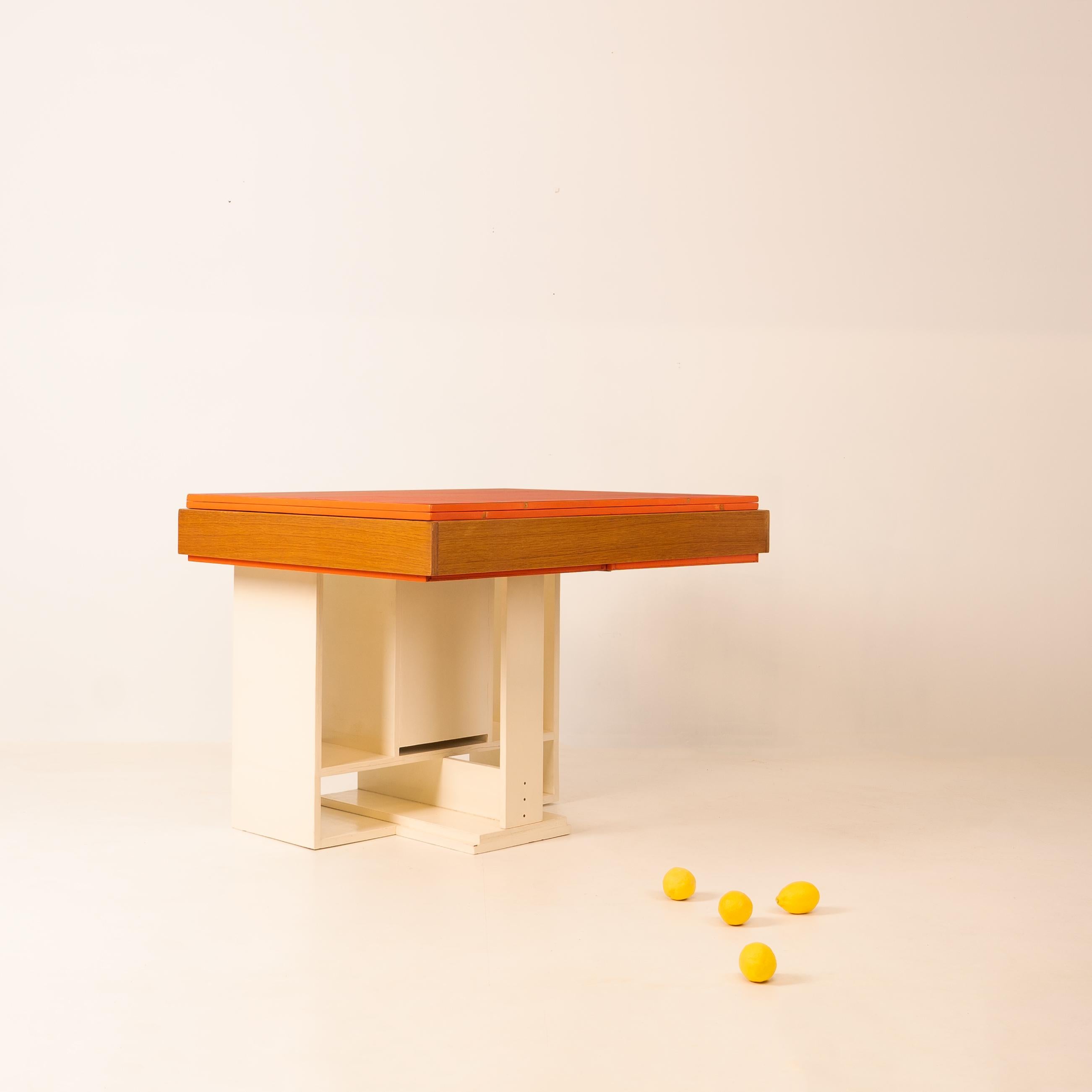 Architect work System table

Unique piece, special order, Circa 1970

White and orange lacquered wood

Height 77 x Width 100 x Length 81 (162 cm open)

Condition report: good original condition, some slight lacquer retouching, scratches and wear
