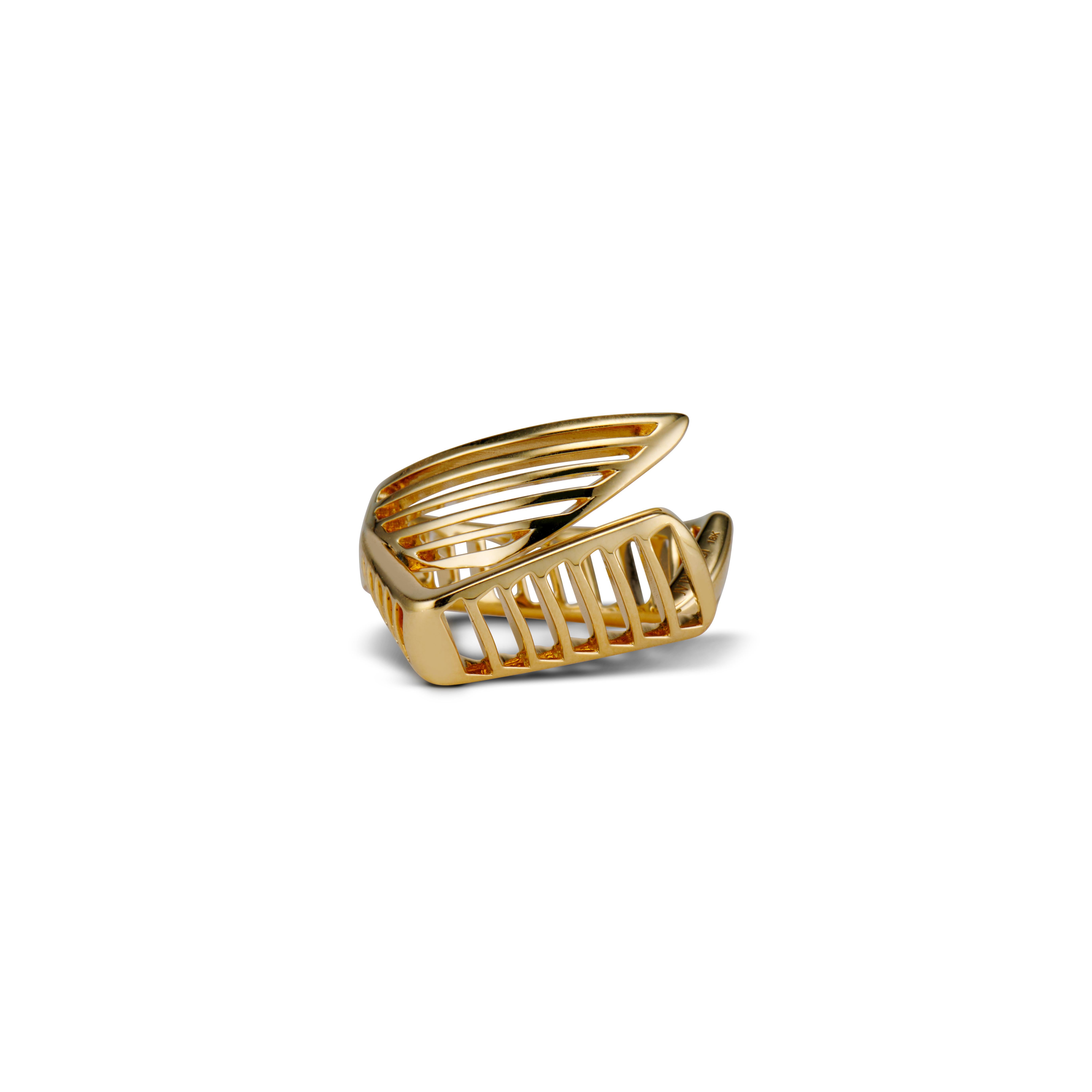 The FENESTRA AFFINITY ring symbolizes the allure of embracing an open heart. Every architectural cut-out within the ring serves as a portal for fresh opportunities to flow into your life. Crafted from solid 18kt yellow gold, the AFFINITY ring