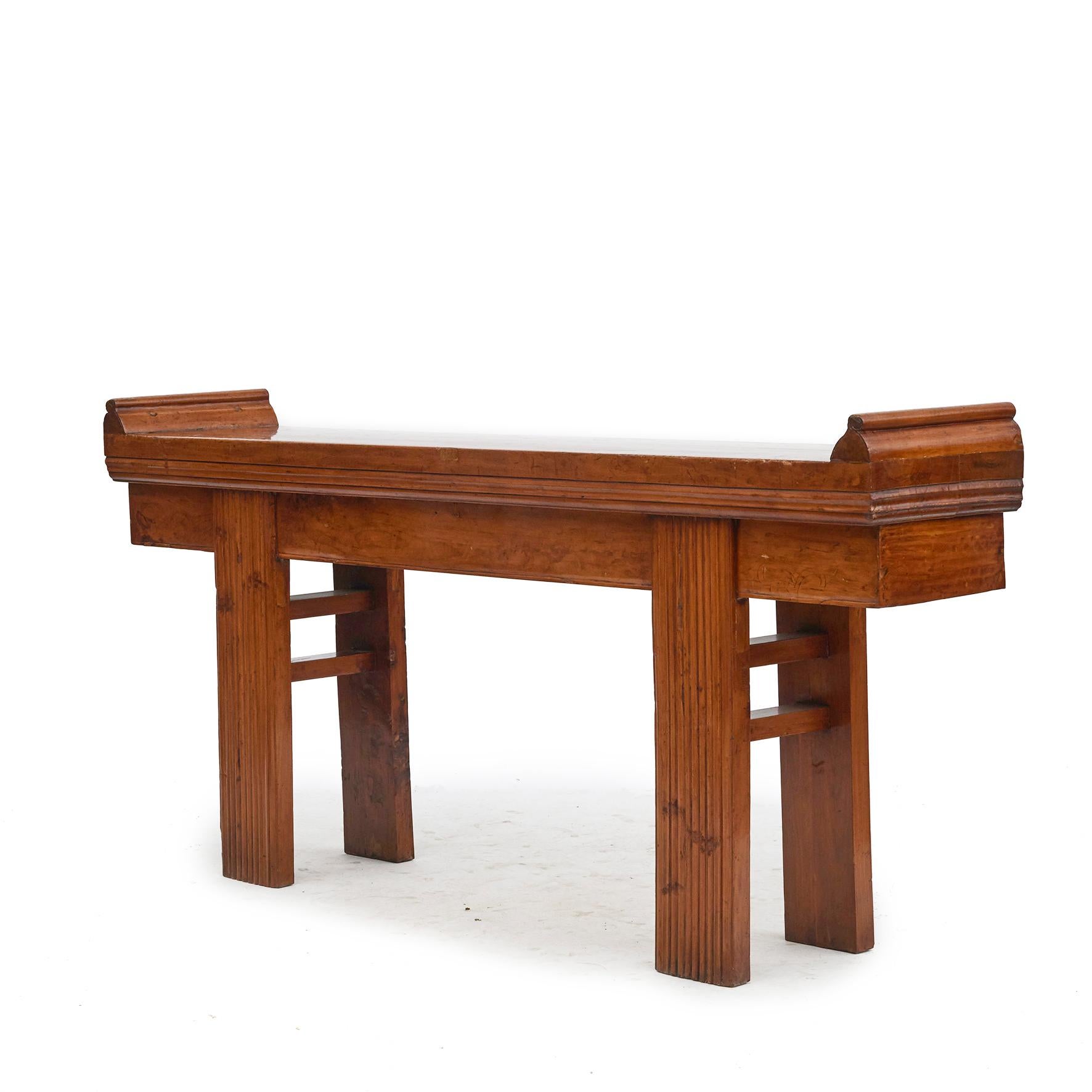 Architectural altar table / side table.
Made in the relatively rare and very beautiful peach wood.
Below the top, profiled moldings and rectangular legs with grooves.

The table appears with a beautiful glow and natural patina.

Jiangsu