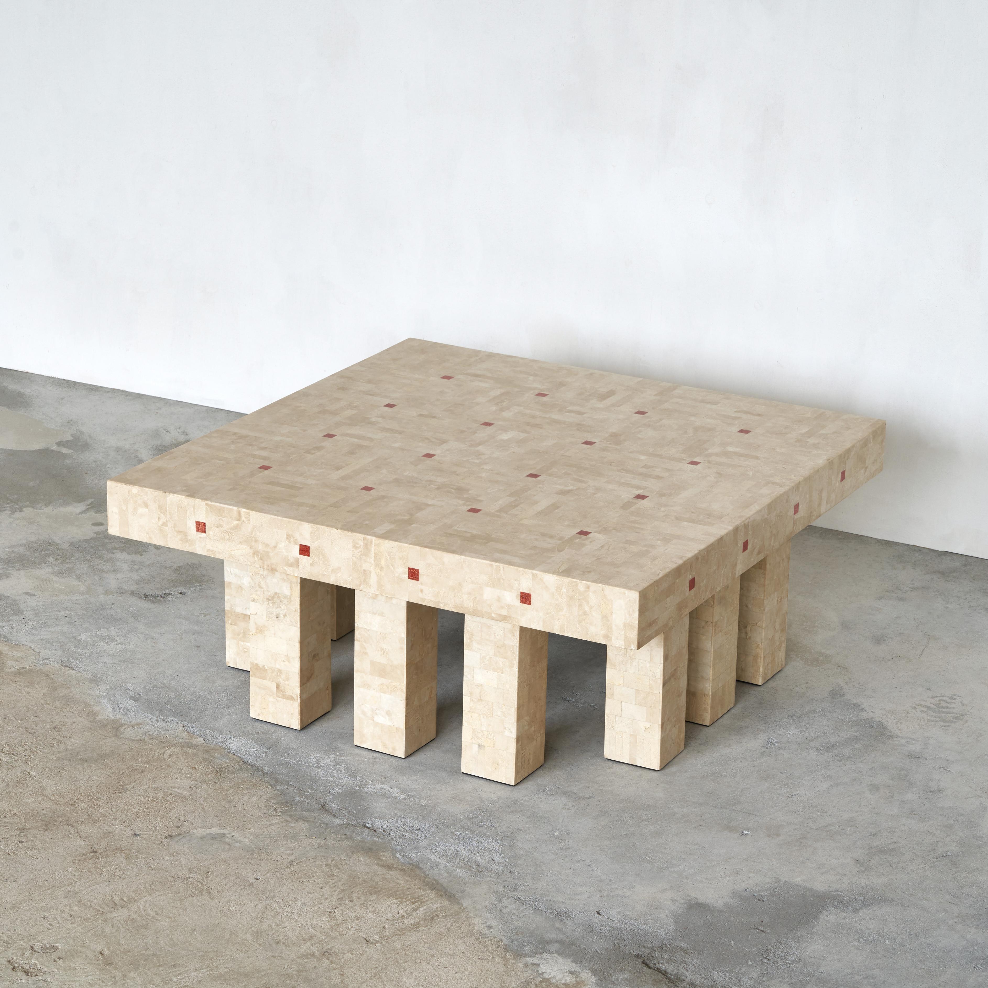 Large architectural coffee table in travertine, Belgium, 1970’s.

This is a real conversation piece with fantastic proportions and detail. The inlayed travertine is very refined and the twelve (!) feet make this a highly unusual table. A rare