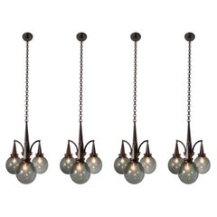 Architectural Chandeliersin Patinated Brass and Olive Green Hand Blown Glass