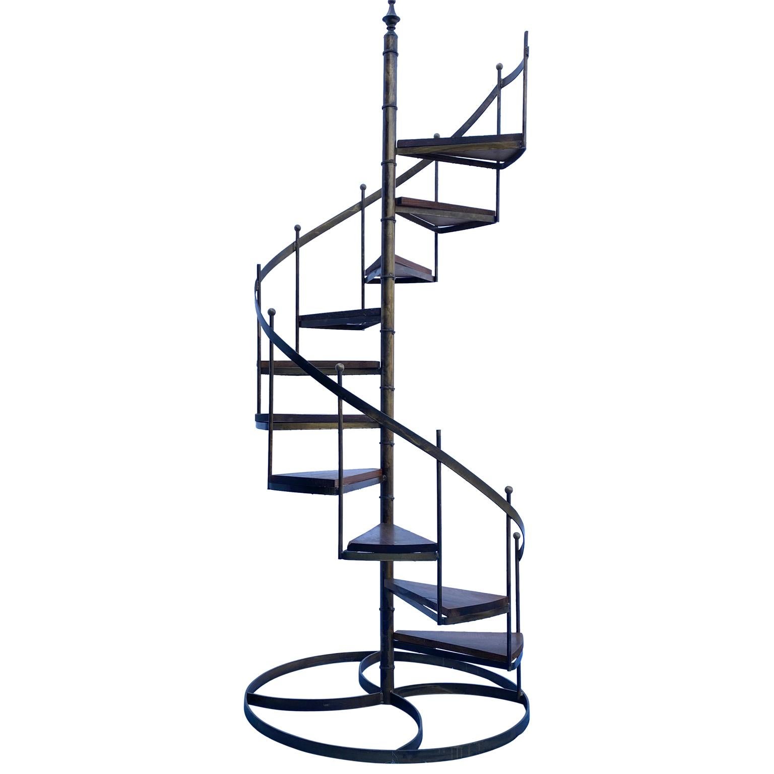 Circular wrought iron display staircase with 10 wood shelves.

A circular bronzed wrought iron display staircase from the 1960s.