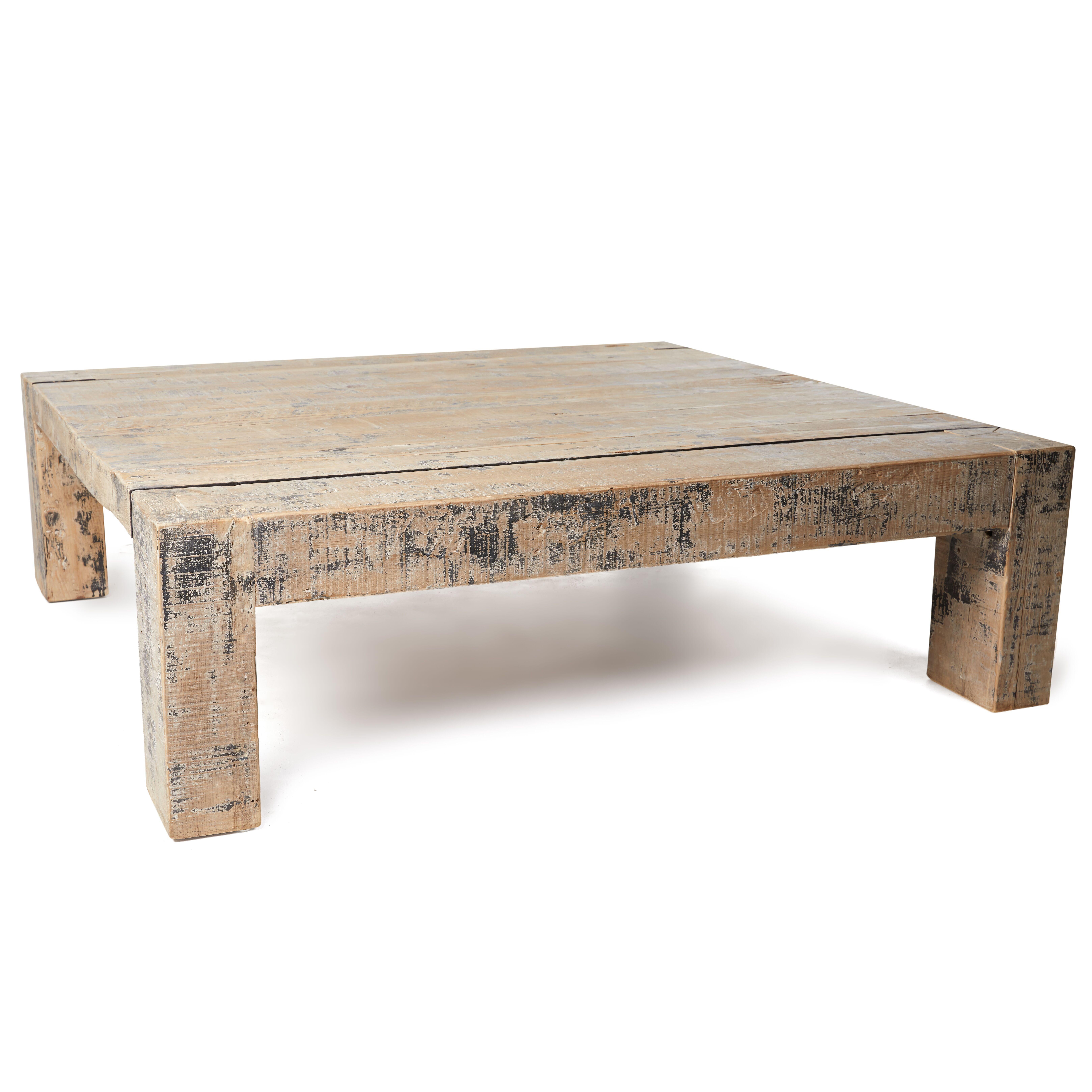 Architectural coffee table made from reclaimed pine elements.