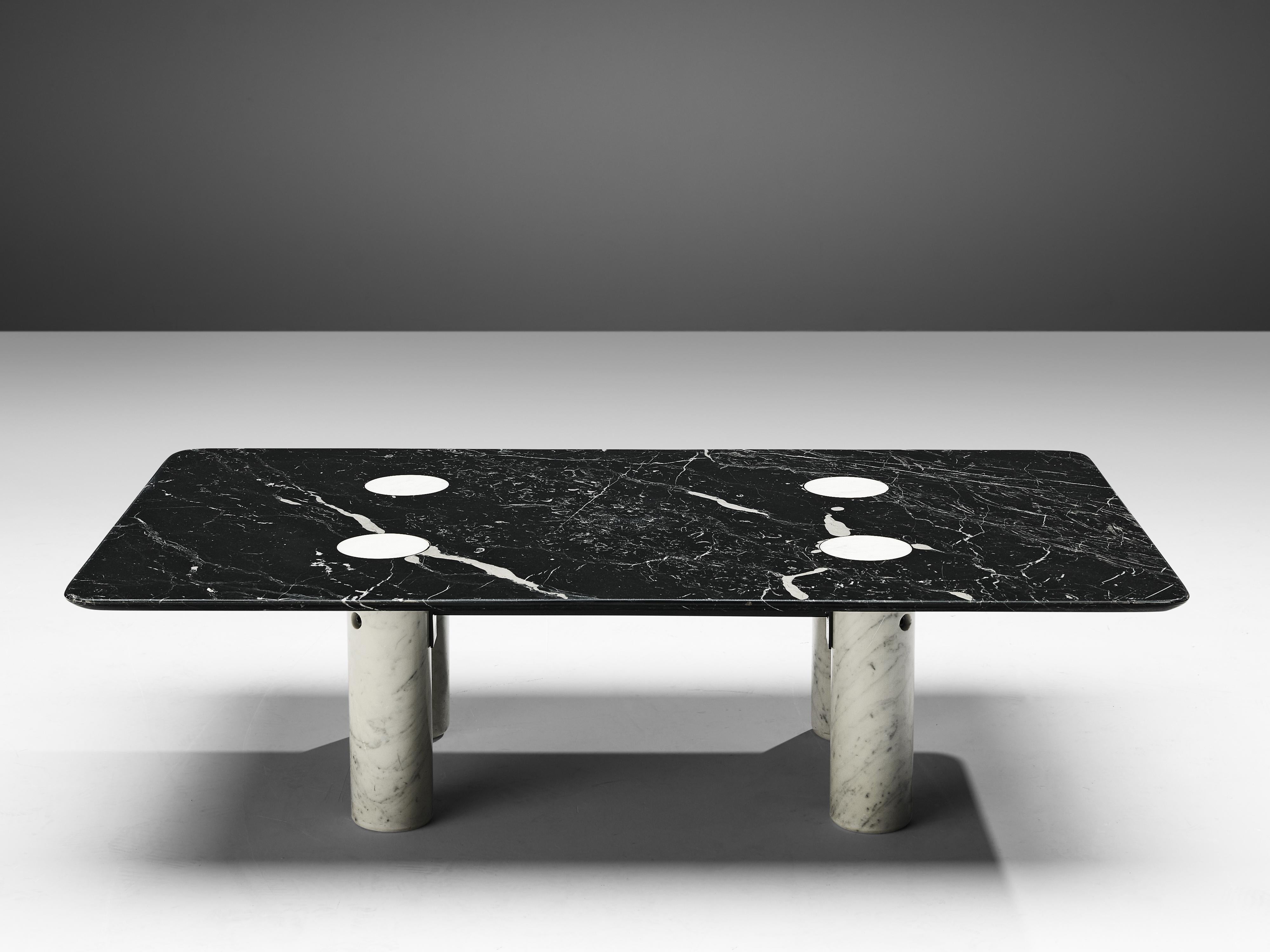 Coffee table, marquina marble, marble, metal, Italy, 1970s

This sculptural coffee table is a skillful example of postmodern design. The square tabletop in black marquina marble with dynamic white veins contrasts with four white marble cylindric