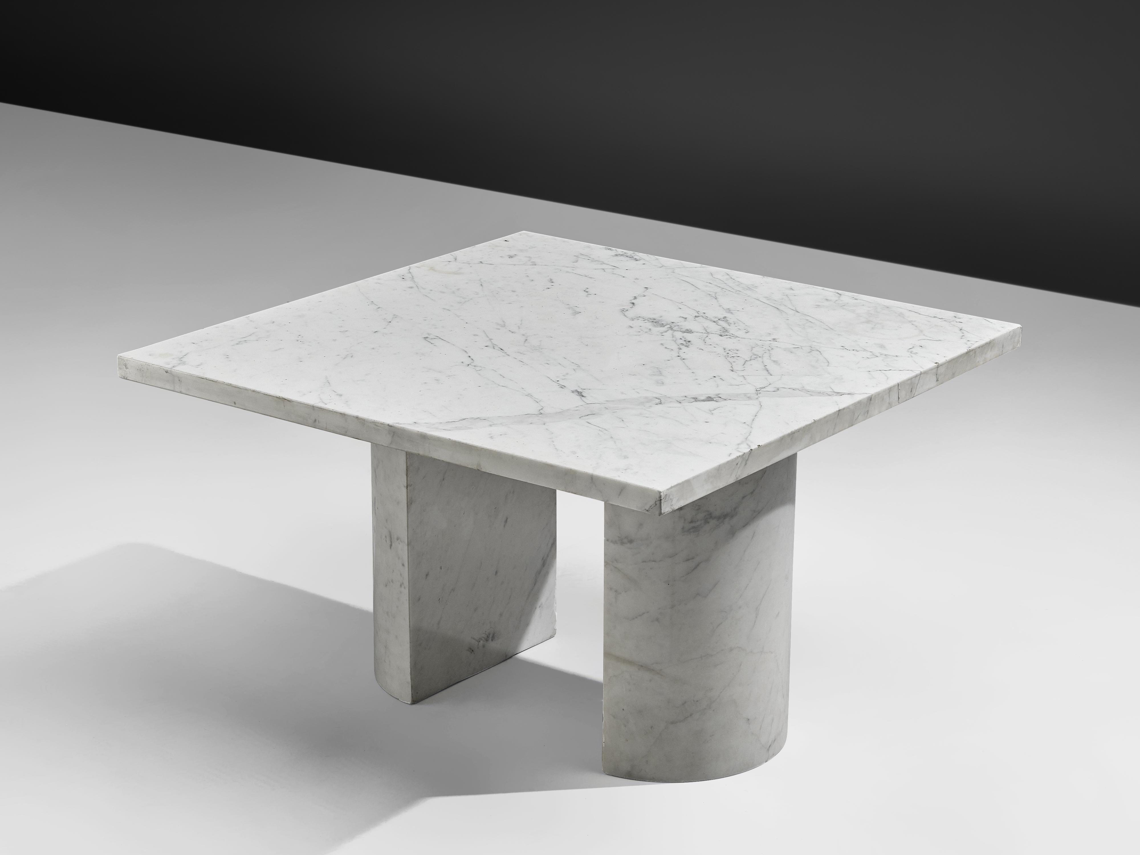 Coffee table, marble, Italy, 1970s

This cocktail table features a rectangular shaped marble tabletop. The top is supported by two semi-circular columns. The aesthetics are archetypical for postmodern design, bearing references to architectural