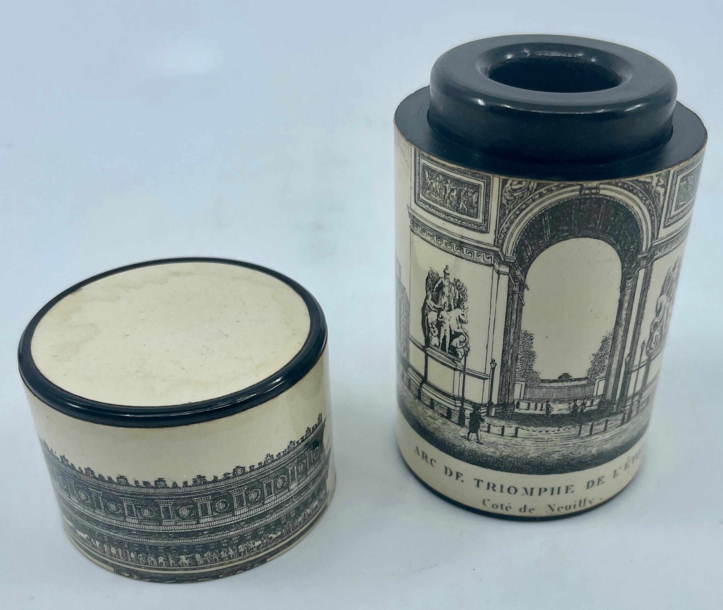 Architectural cylinder box. Small lacquered cylindrical container with black and cream engraving of the Arc de Triomphe de L’Étoile, from the Neuilly side, with black edging to top and bottom of cylinder; in the manner of Creil / Coquerel-et-LeGros