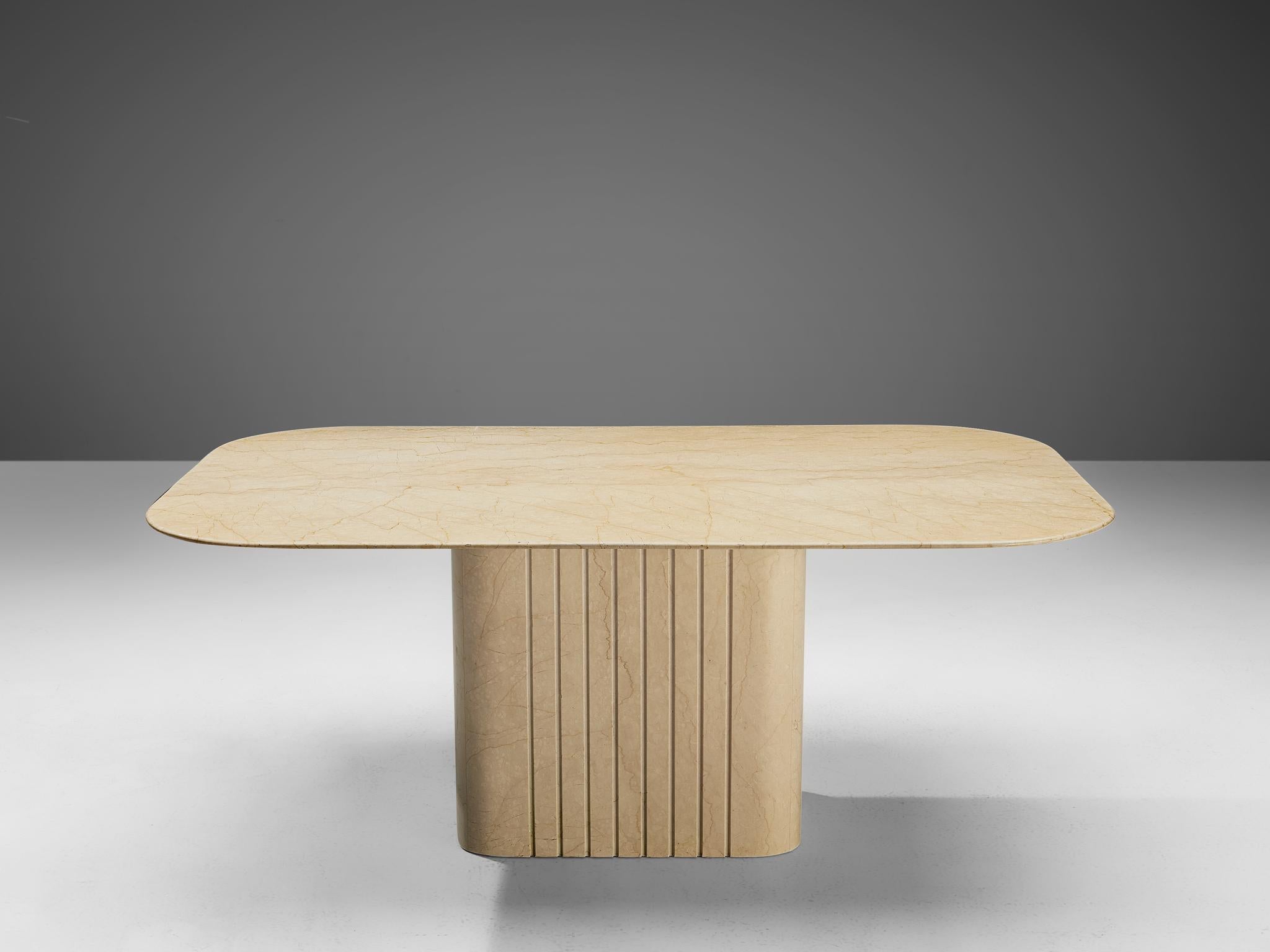 Dining table, travertine, Italy, 1970s

The designer created an eccentric table with a certain monochrome, sculptural look, which is achieved by exclusively using travertine, a natural stone from Italy. The body holds an intricate construction and