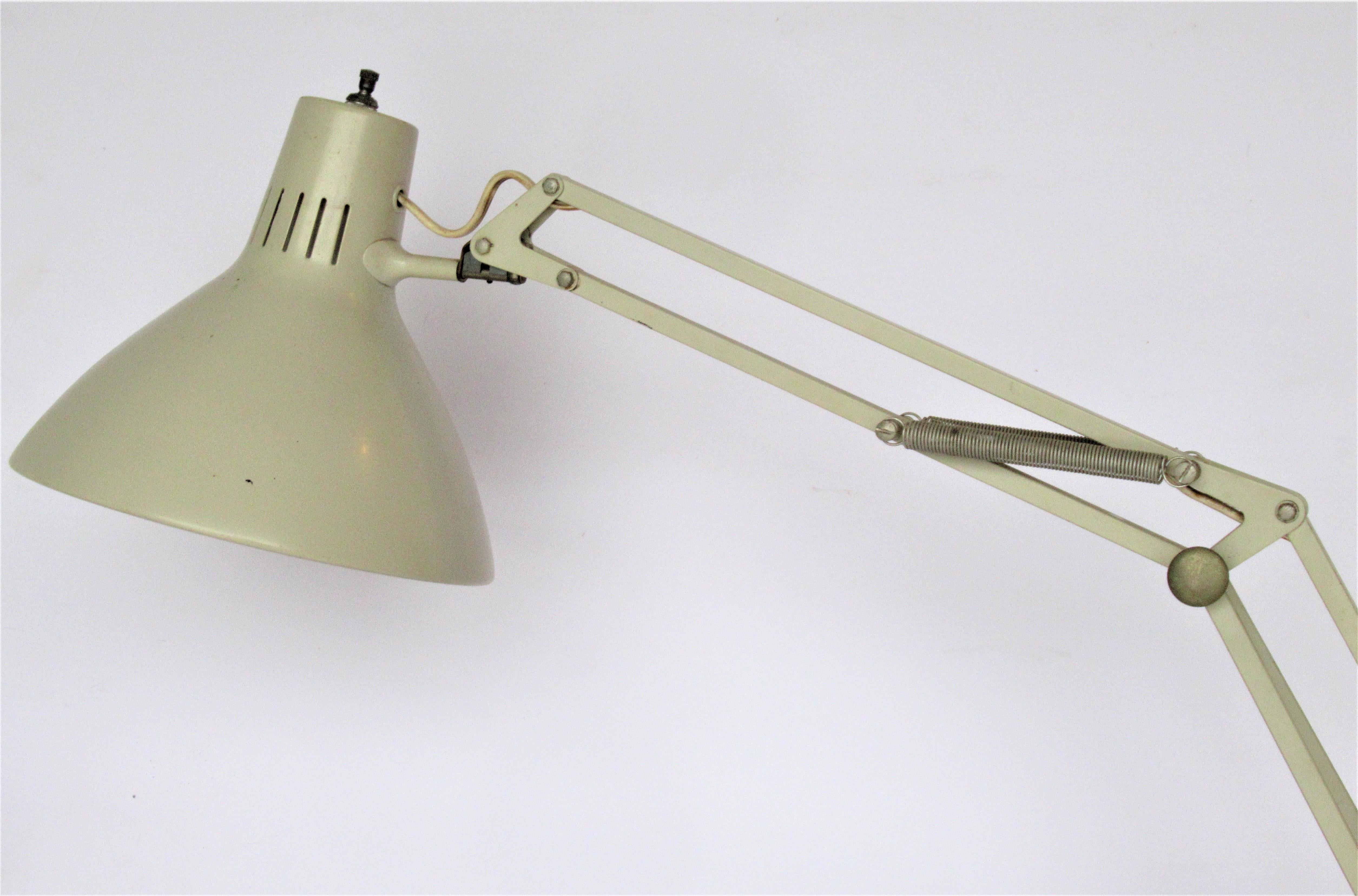 Multi-position architectural drafting desk lamp by Luxo, Norway in cream white lacquered finish, circa 1960s. Great all original condition. Look at all pictures and read condition report in comment section.