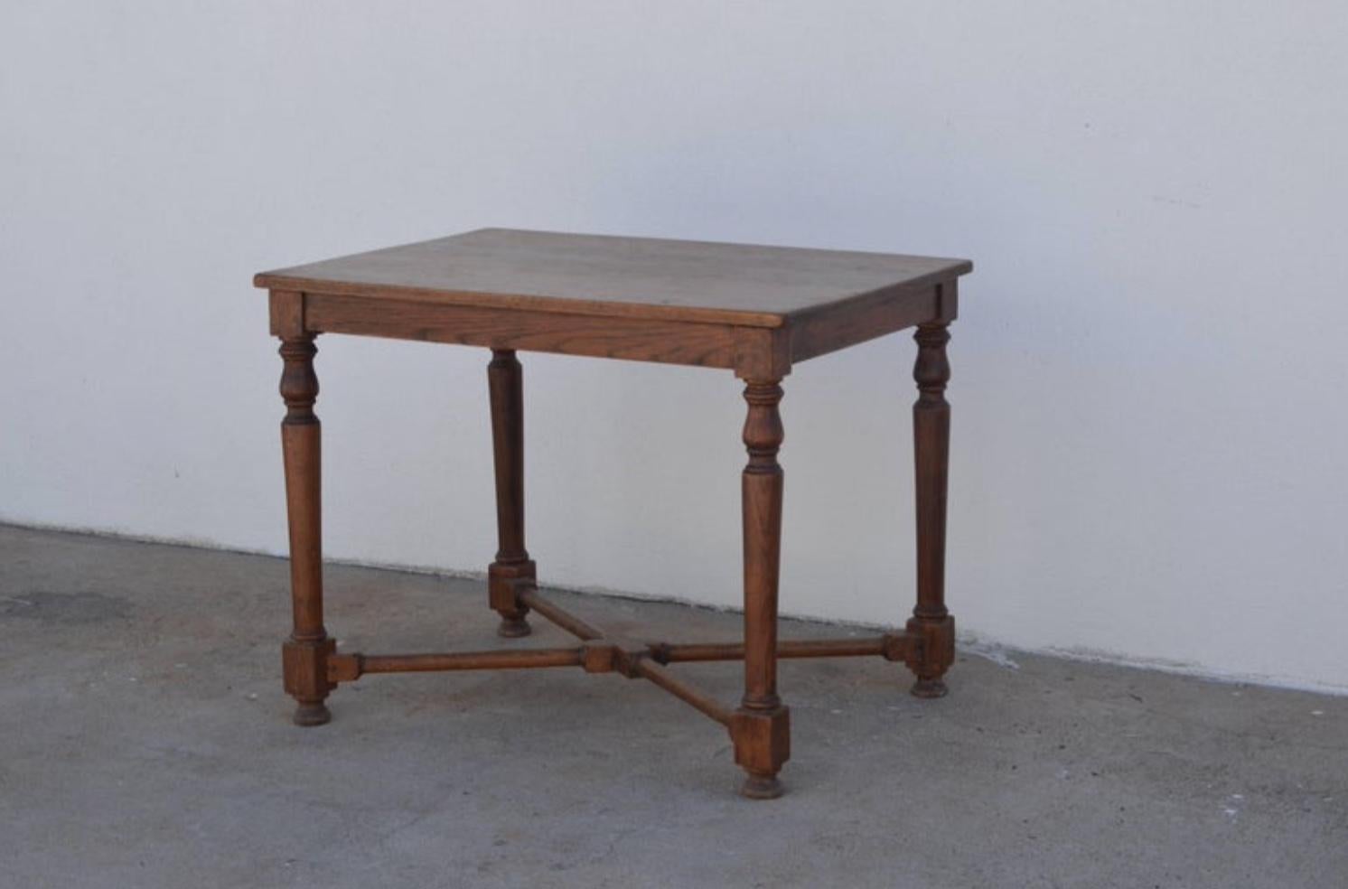 Elegant architectural French oak center or game table. Very sturdy. Great as a small desk or writing table as well.