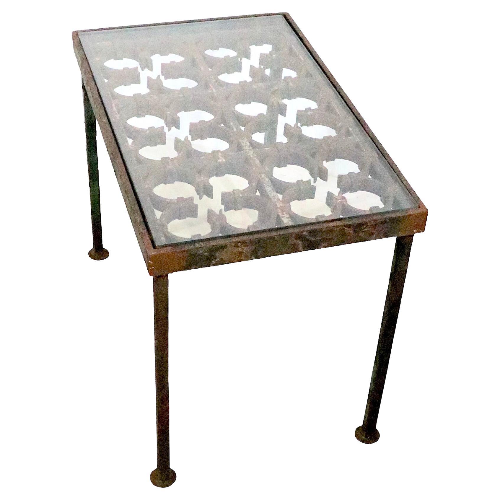 Architectural Garden Patio Side Table constructed of a cast iron panel  For Sale