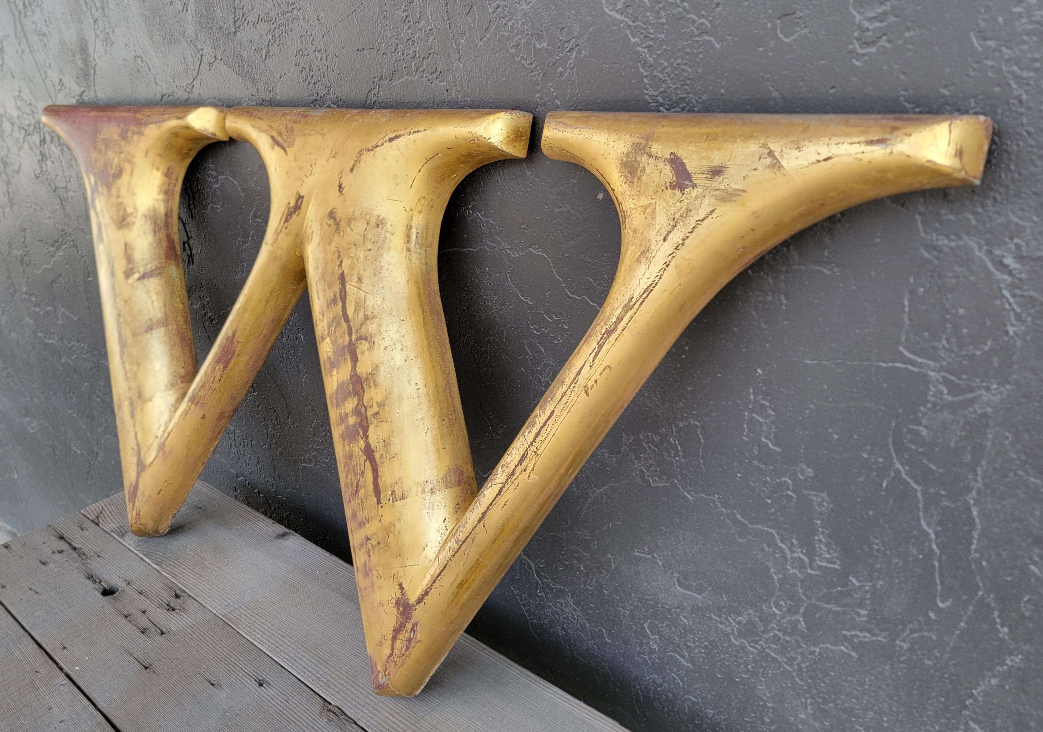 A large-Scale gold leaf sign letter measuring 46.75 inches wide. Made  of cast metal with gold leaf finish. Nice patina.

46.75 inches wide.
20.25 inches high.
1.75 inches deep.