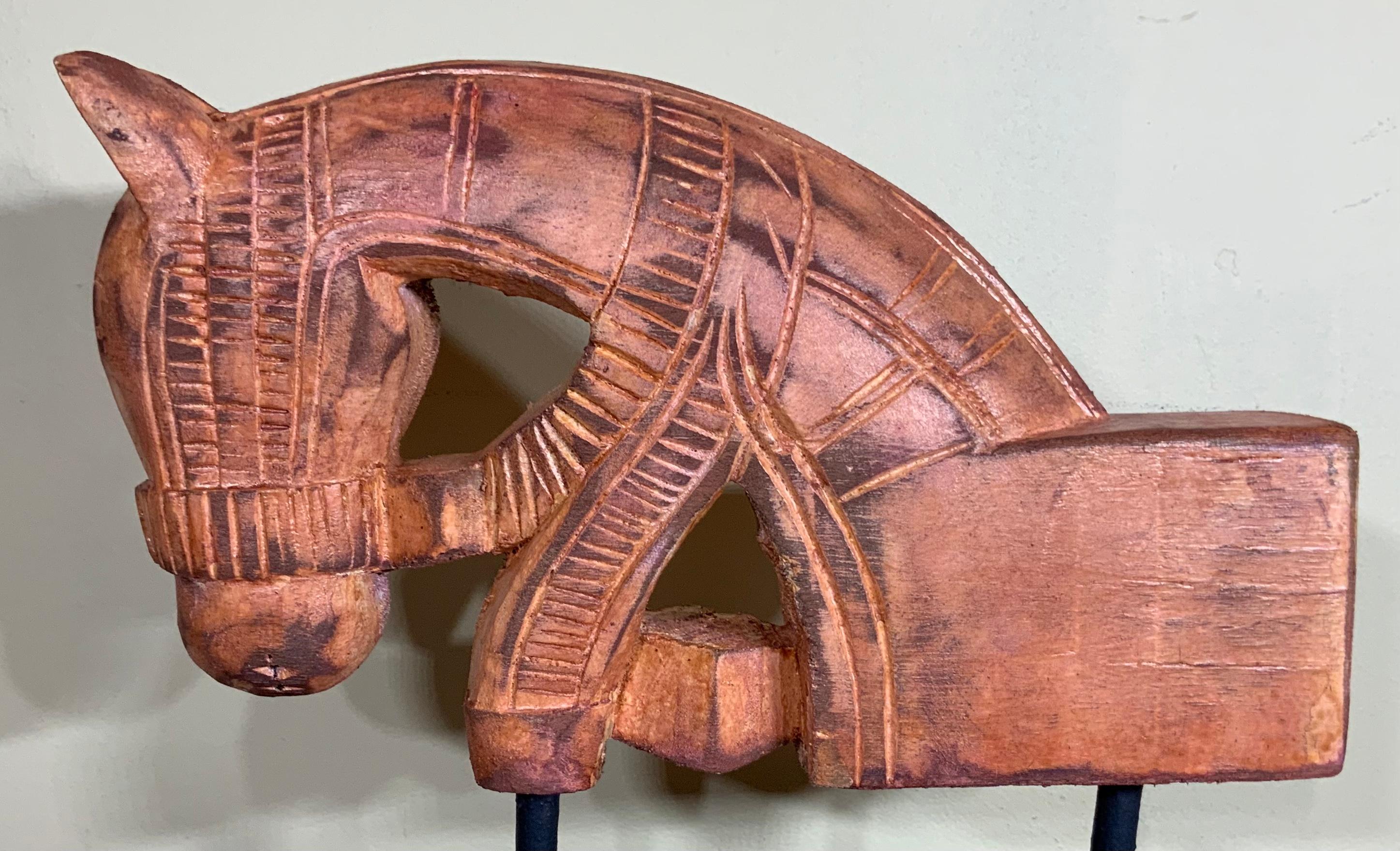 Horse sculpture made of hand carved solid wood, nice carving details, hand painted with beautiful rustic patina.
Professionally mounted on wood base. Exceptional object of art for display.