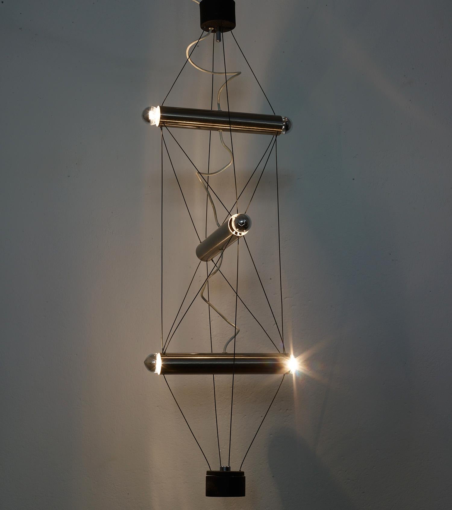 Architectural metal and steel wire suspension by Lumi, Italy, 1970

Lumi was a well respected and renown Italian editor of lighting designs from Oscar Torlasco among others.

The design of this great suspension bears the mark of the radical
