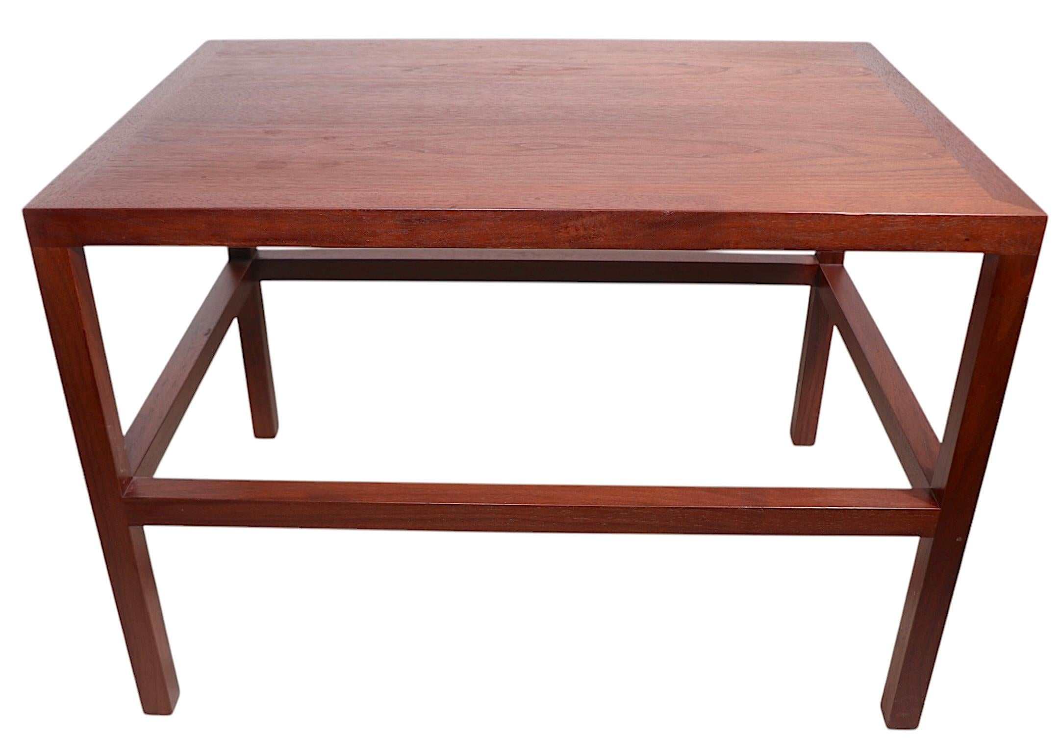 Architectural Mid Century end, or side table, attributed to Edward Wormley for Dunbar, unsigned. The table is well constructed, and in good condition, showing only minor cosmetic wear, normal and consistent with age. 
